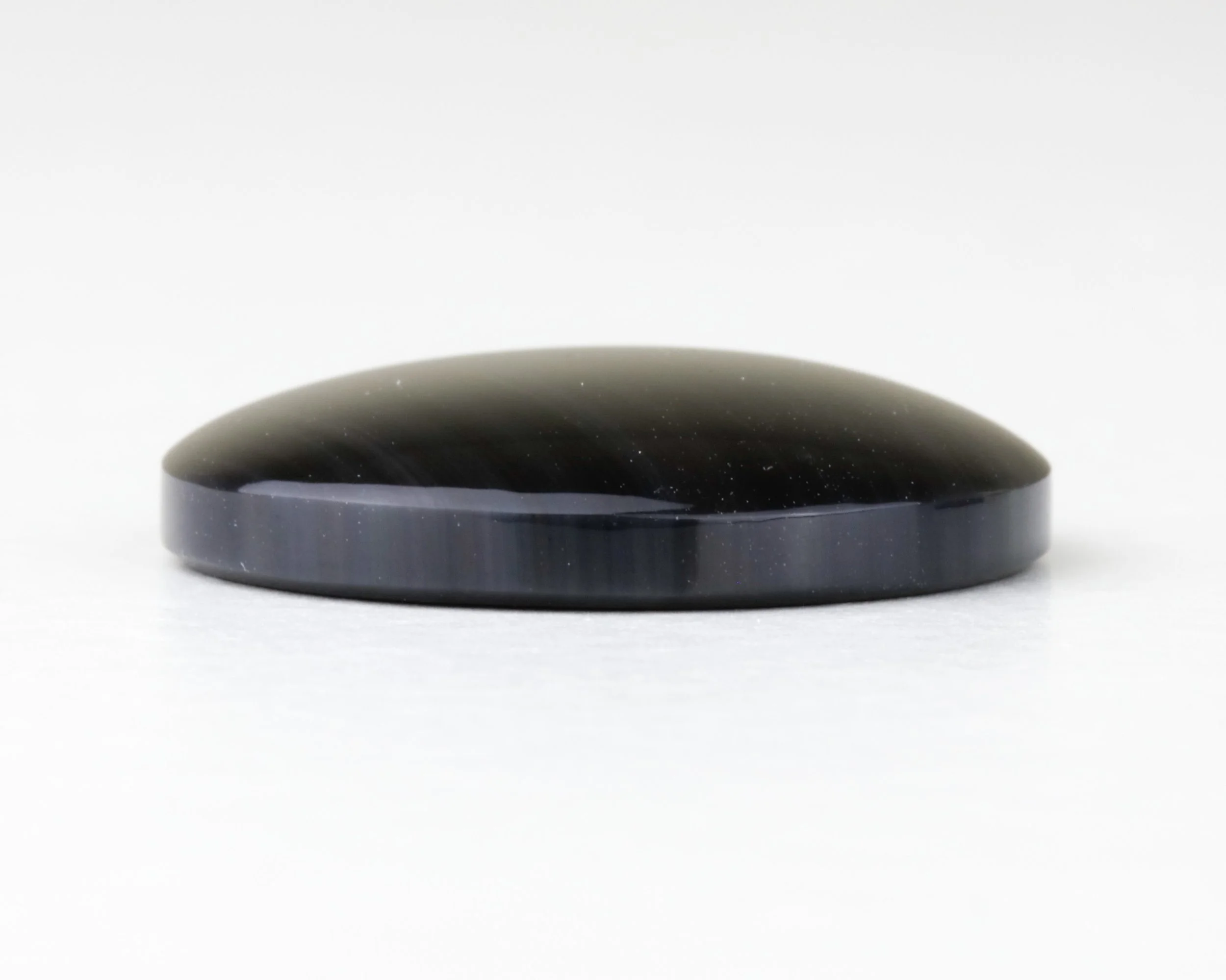 What is a cabochon? This is the profile of a cabochon to show the parts of a cabochon: the dome, the girdle, and the flat base