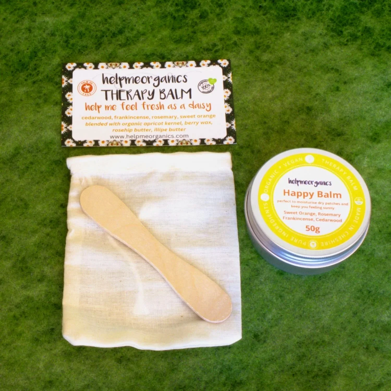 Happy Therapy Balm 50g in a recyclable aluminium tin with wooden spatula, canvas gift bag and information card, handmade aromatherapy balm with natural and organic ingredients.