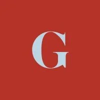 A large white letter G on a red background.