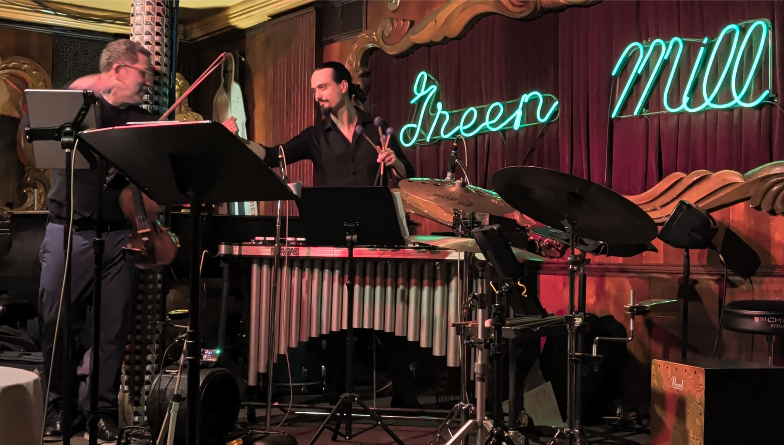 Debut performance of The Flourish Ensemble at the Green Mill. James Sanders and I just finished the set with an arrangement I wrote of the Portuguese piece, "Amor Mais Perfeito". Even cooler, Von Freeman's picture looks over us in the background. Mar