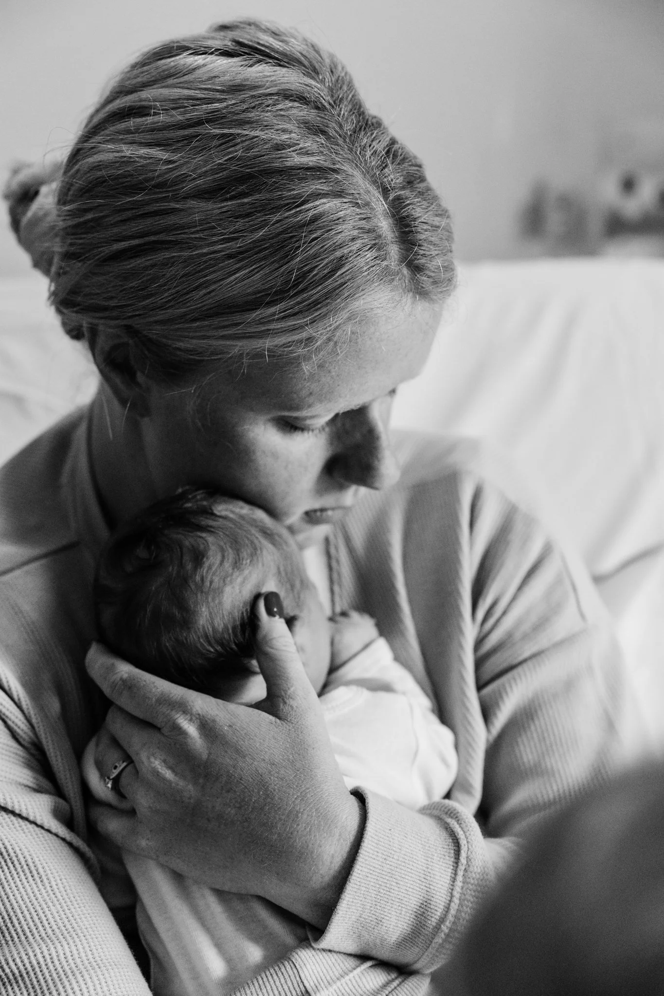 New mother holding her newborn baby, black and white image in Horsham, Victoria