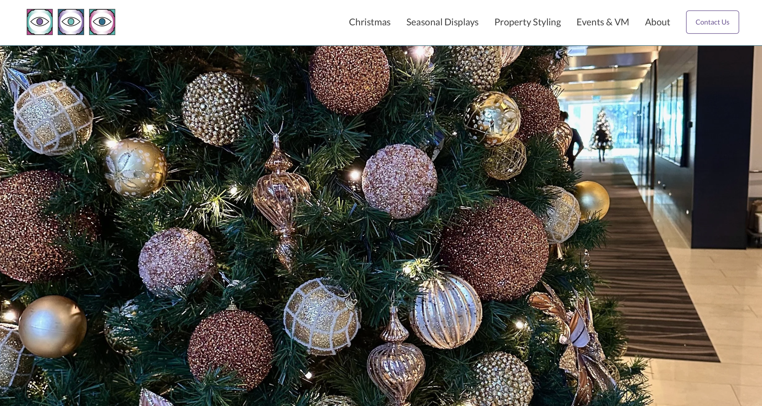Homepage header showing three colorful square icons with eye designs and the text 'Visual Statements: Creating Unique Environments'.