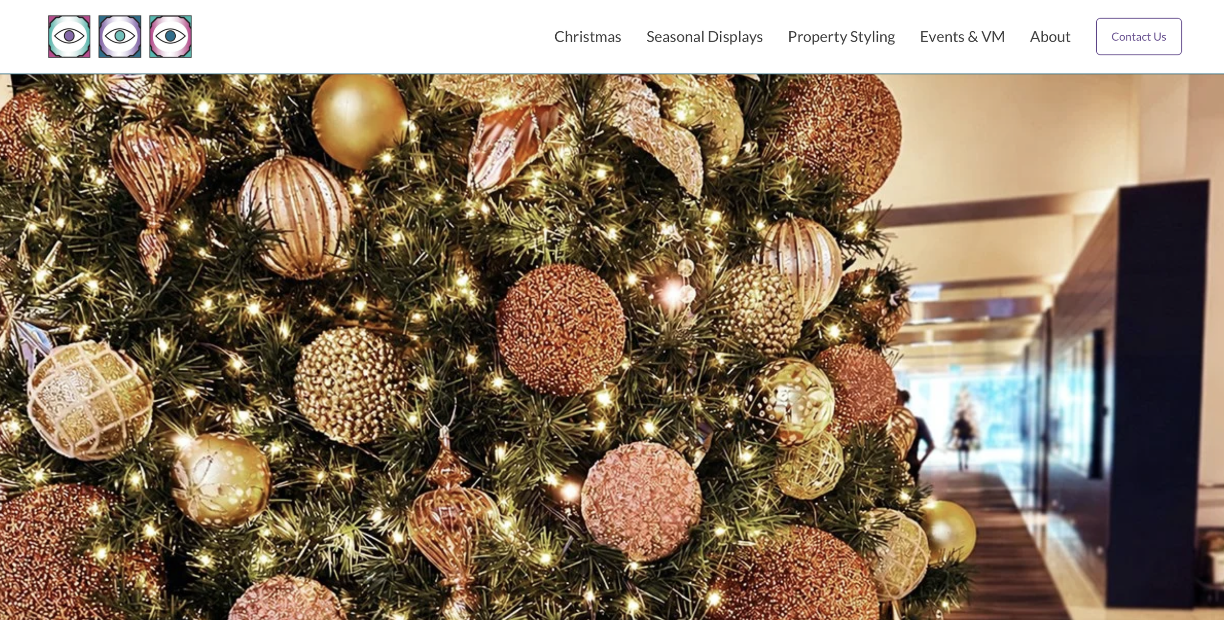 Homepage header showing three colorful square icons with eye designs and the text 'Visual Statements: Creating Unique Environments'.