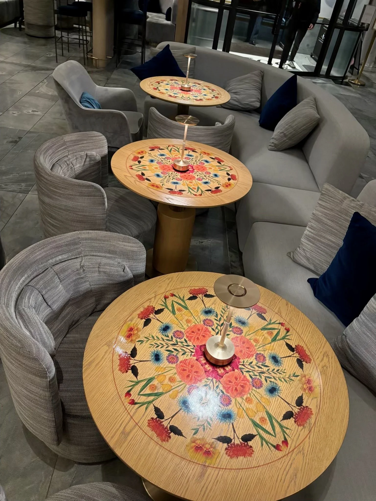 Vinyl decal on tables for Melbourne International Flower Show at Lanson Place Parliament Gardens, Melbourne. Design & Install