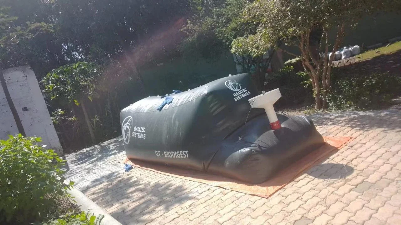 Room with dark vermicompost  pile on tarp next to window