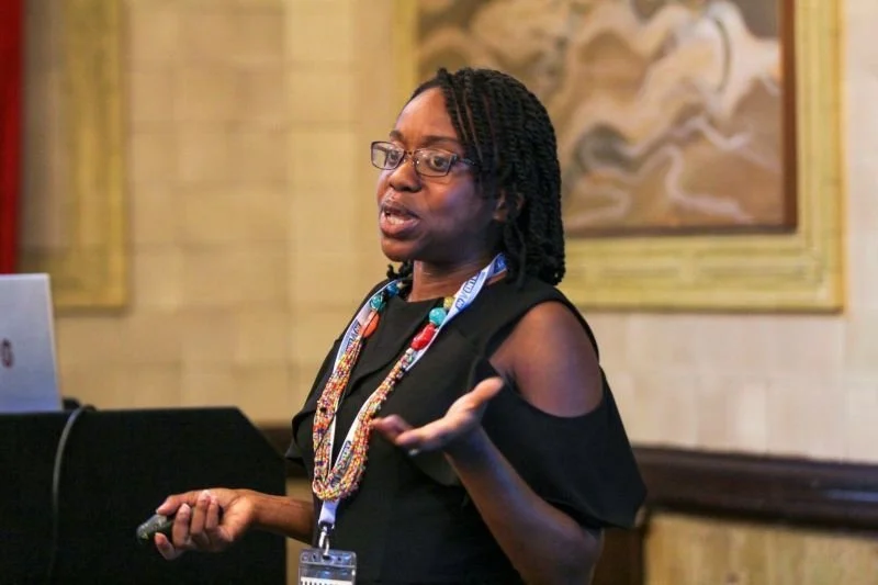 Ekua Cant speaking at the office Managers Show.