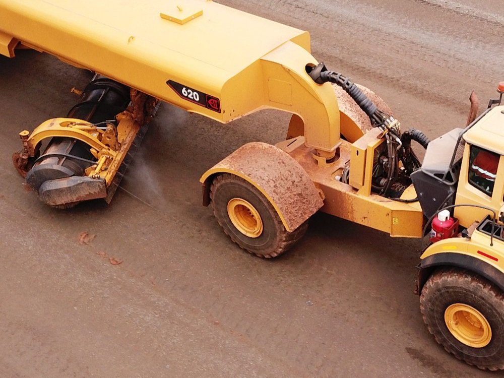 Wide 6-metre brush efficiently clears large haul roads of debris