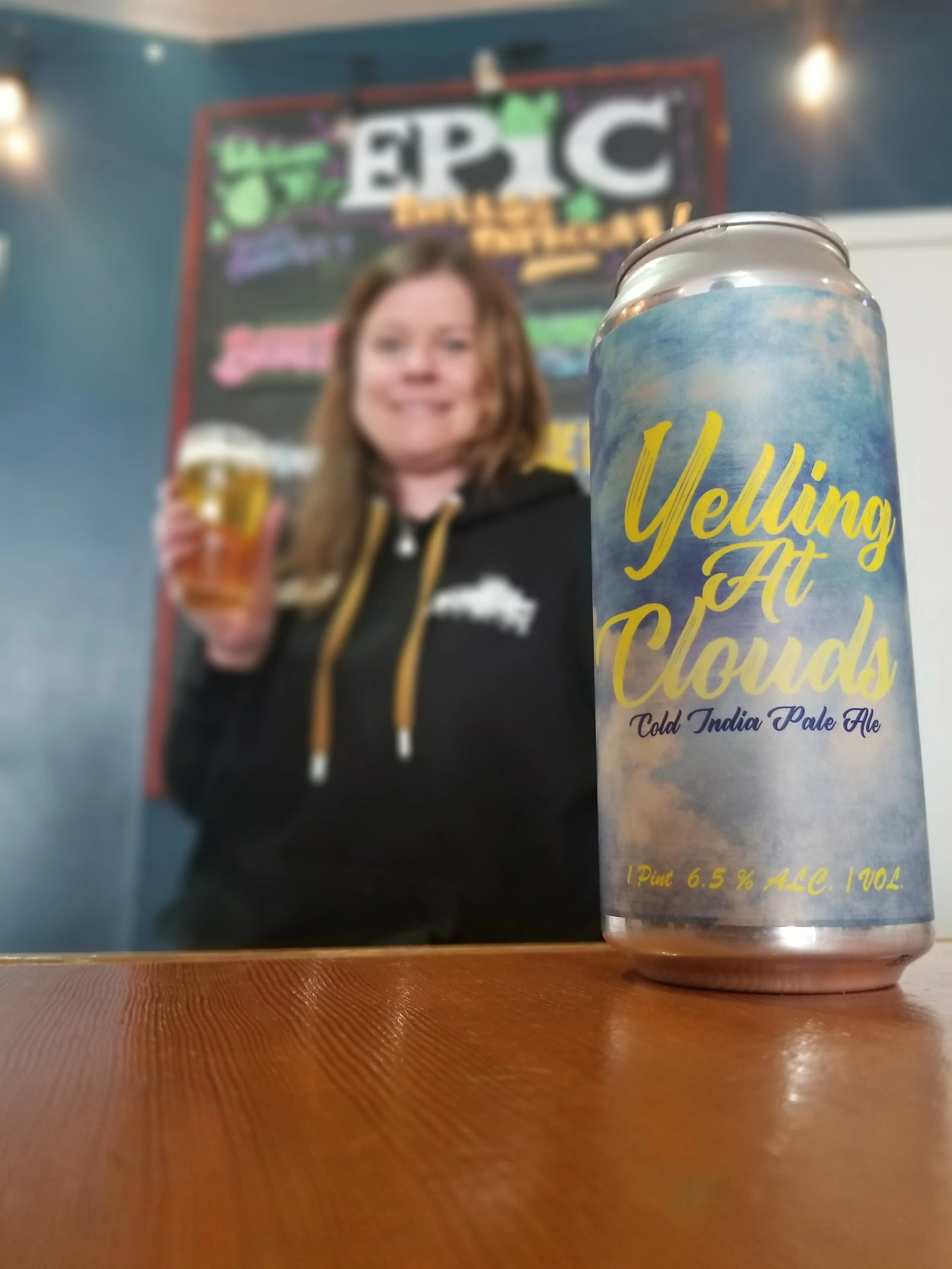 A bartender wearing a Big Bad Baptist Hoodie.