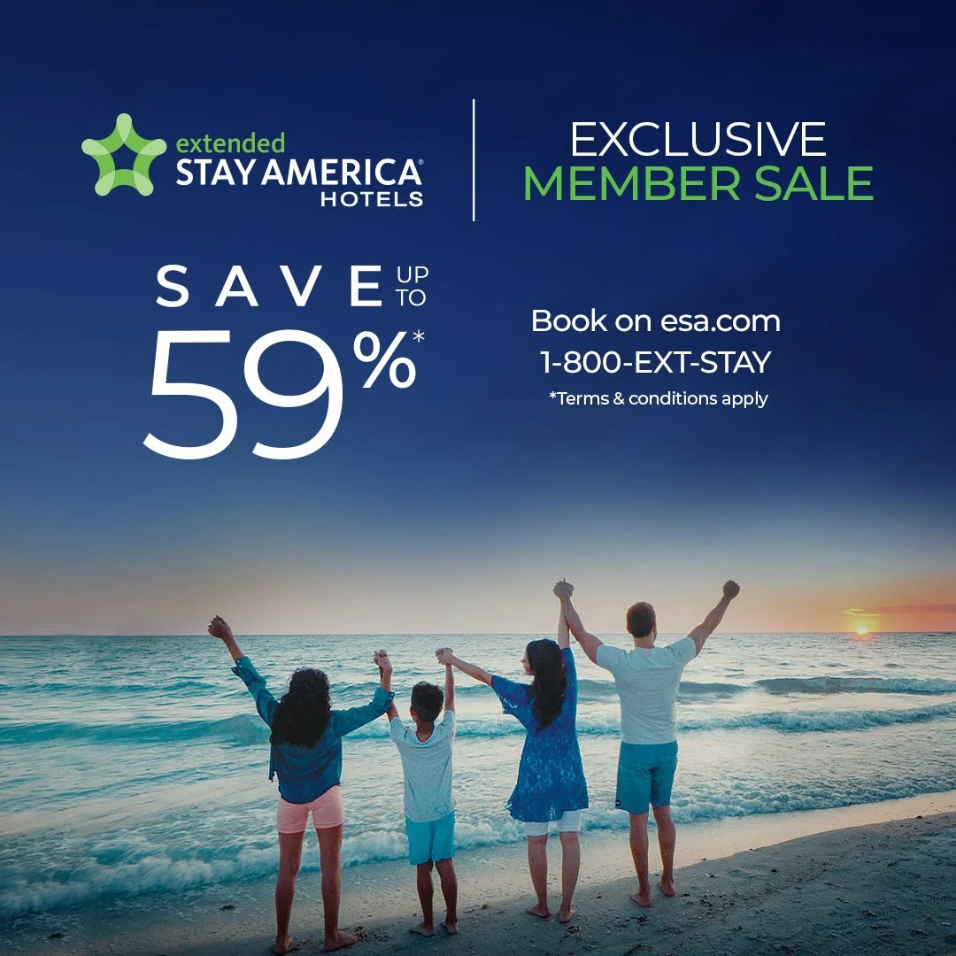 Group of four people holding hands and raising arms on a beach at sunset, with promotional text for Stay America hotel member sale offering up to 59% savings.