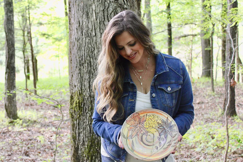 Sgraffito-carved vessel by April Dupuis