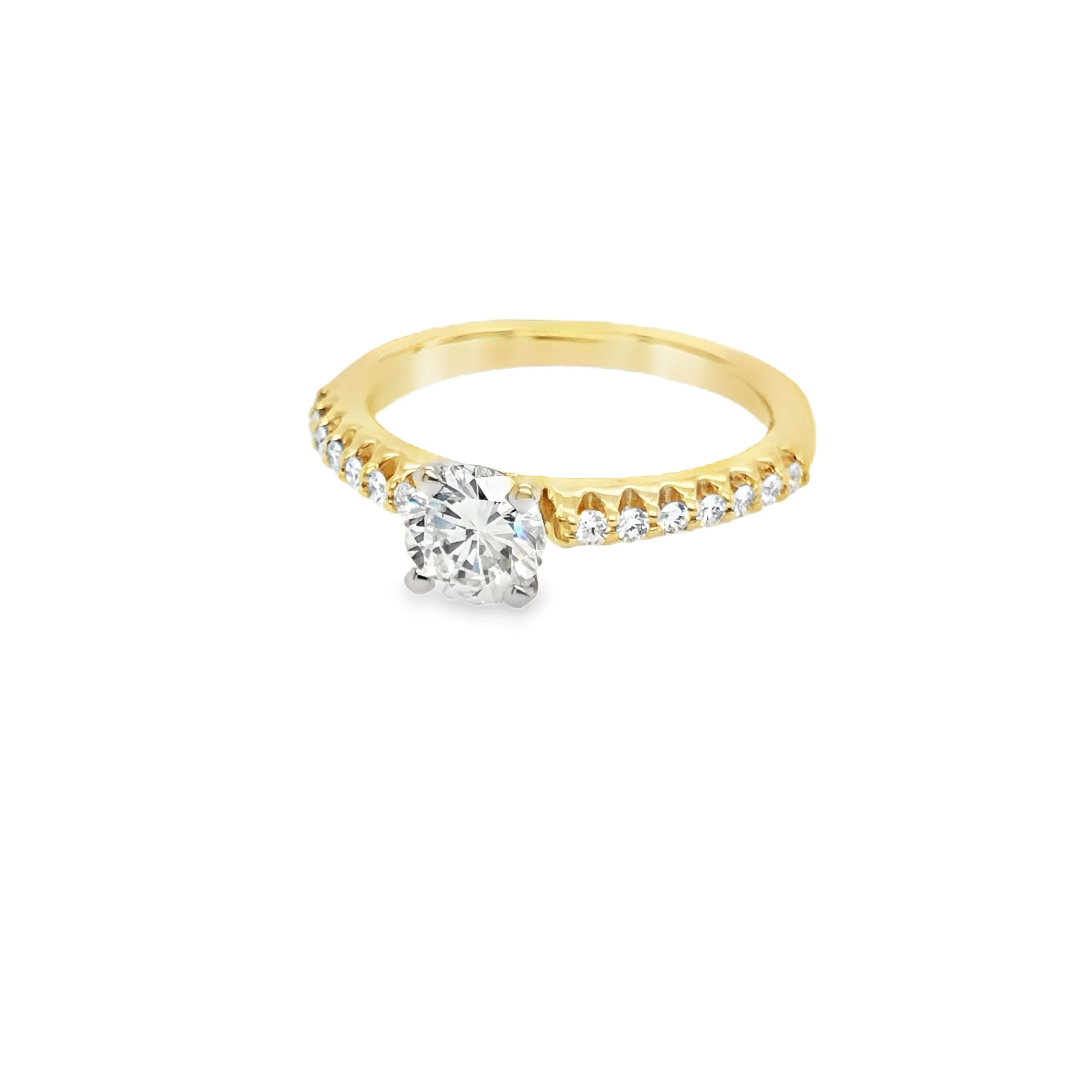 Gold ring with a large central diamond and smaller diamonds along the band.