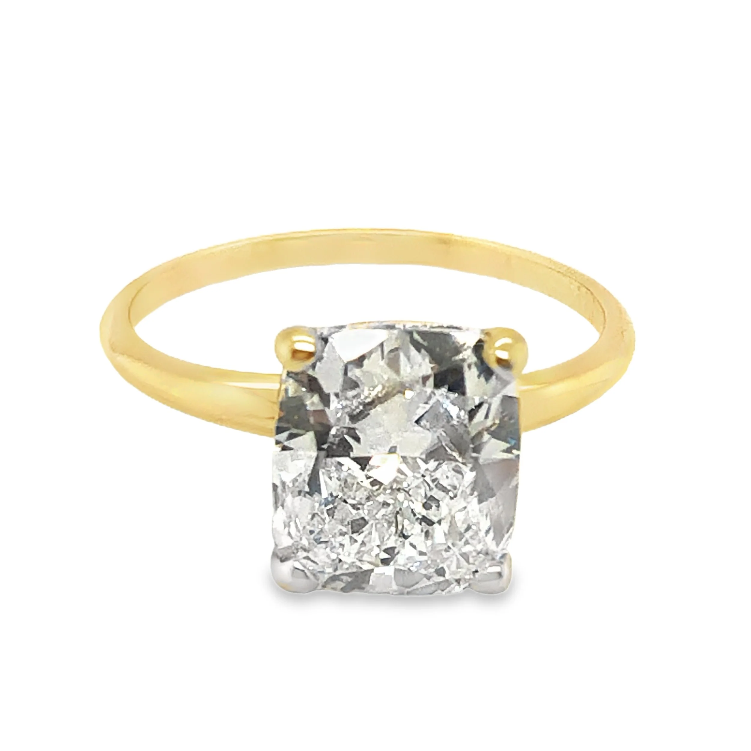 Gold ring with a large square-cut diamond solitaire