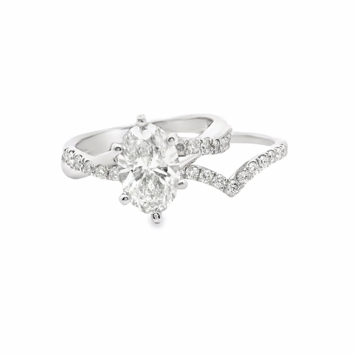 Silver ring with a large central oval diamond and smaller diamonds along the band against a white background.