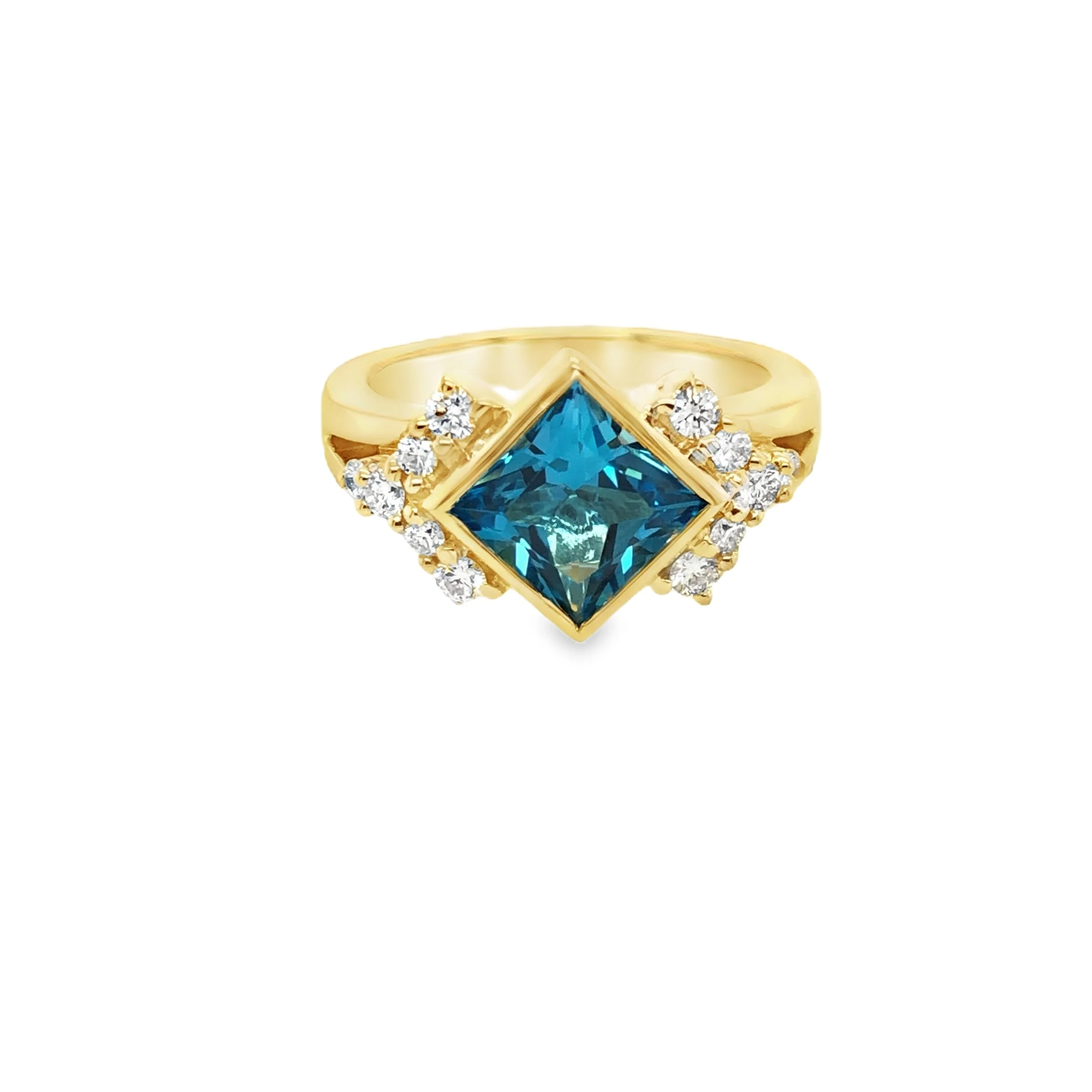 Gold ring with a large blue square gemstone and small clear diamonds on each side.