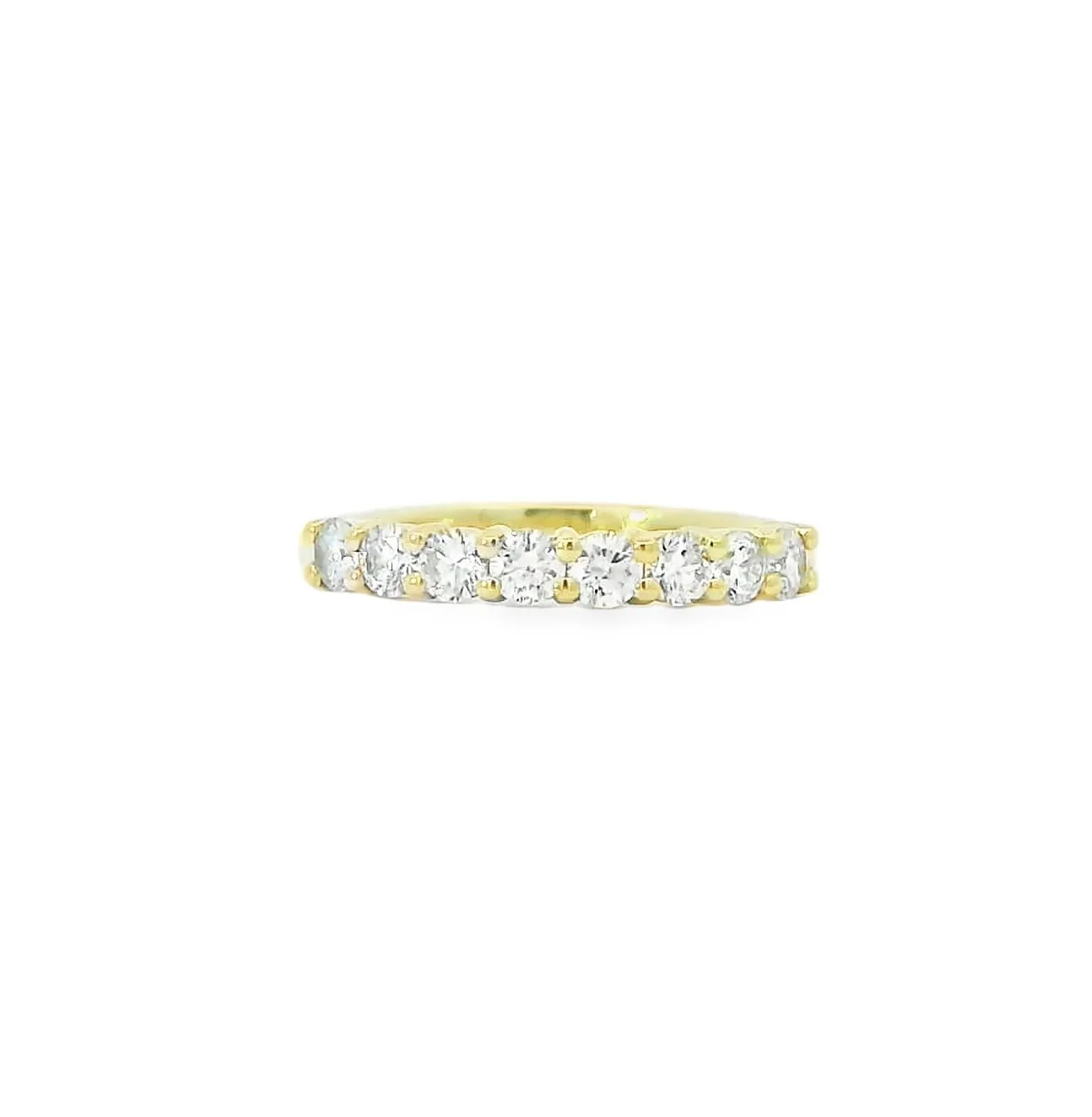Gold ring with a row of diamonds set along the top