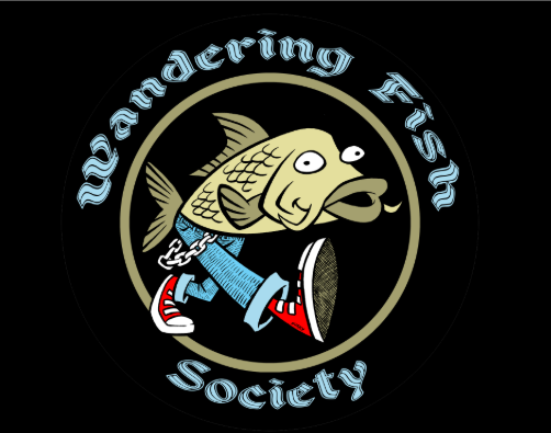An open-mouthed cartoon green fish with human legs in jeans and red converse hightops walking on a black background encircled by the lettering Wandering Fish Society