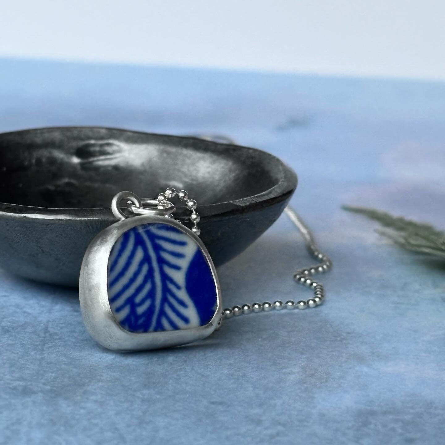 A piece of broken pottery set in sterling silver. I&rsquo;m really enjoying working with a different medium at the moment. #potteryjewelry #porcelainjewelry #handmadejewelry #jeanetteblix