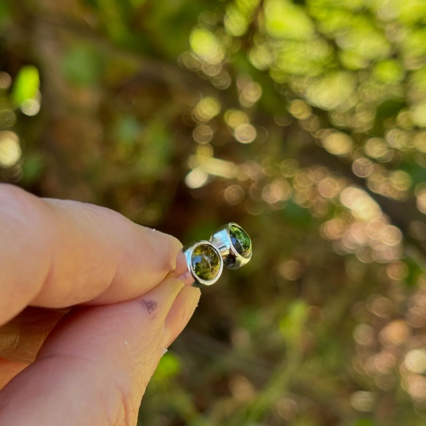Found a little baggie with pairs of green and pink tourmalines that I purchased at a gem show several years ago.  Presently obsessed with making post earrings, I knew exactly how I would use them!