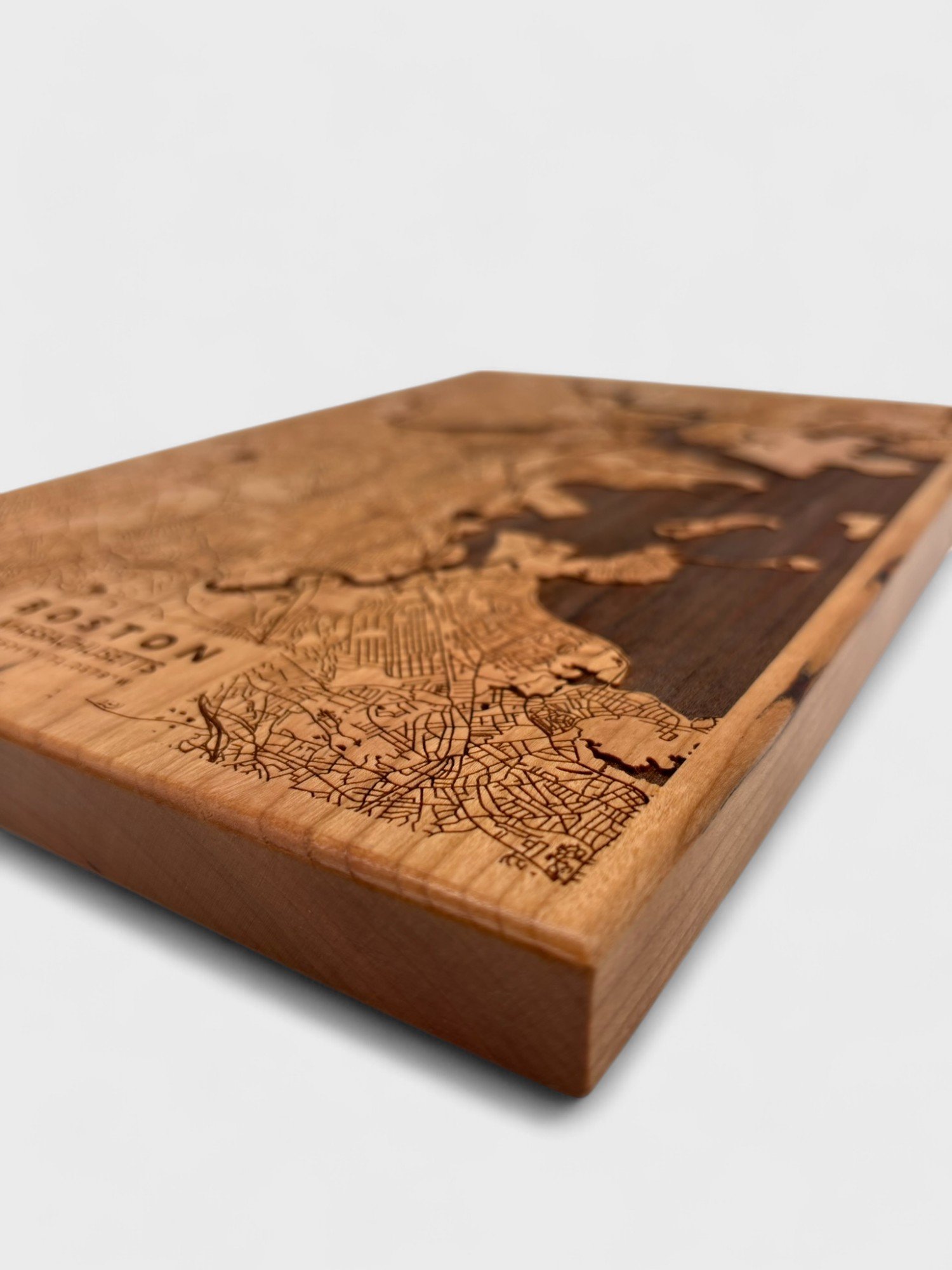a laser etched map on cherry wood