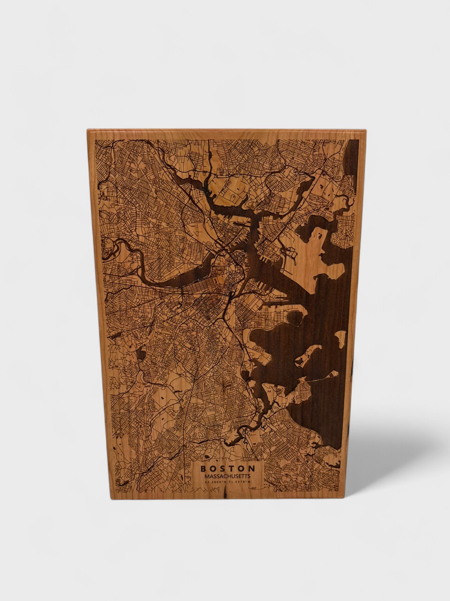 a laser etched map on cherry wood