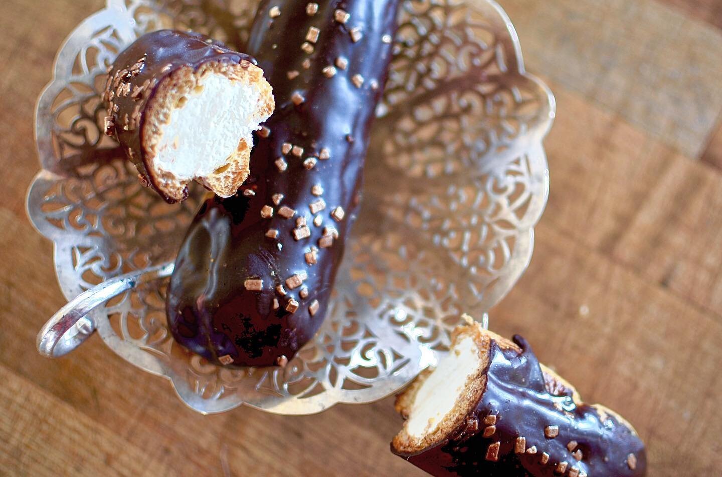 Back in shop, as a special today, are a classic chocolate eclair. Vanilla cr&egrave;me diplomate filled into a pate choux and then dipped in chocolate ganache. Gold dusted chocolate flecks help to guild the lily on this one. Come grab one, or a few. 