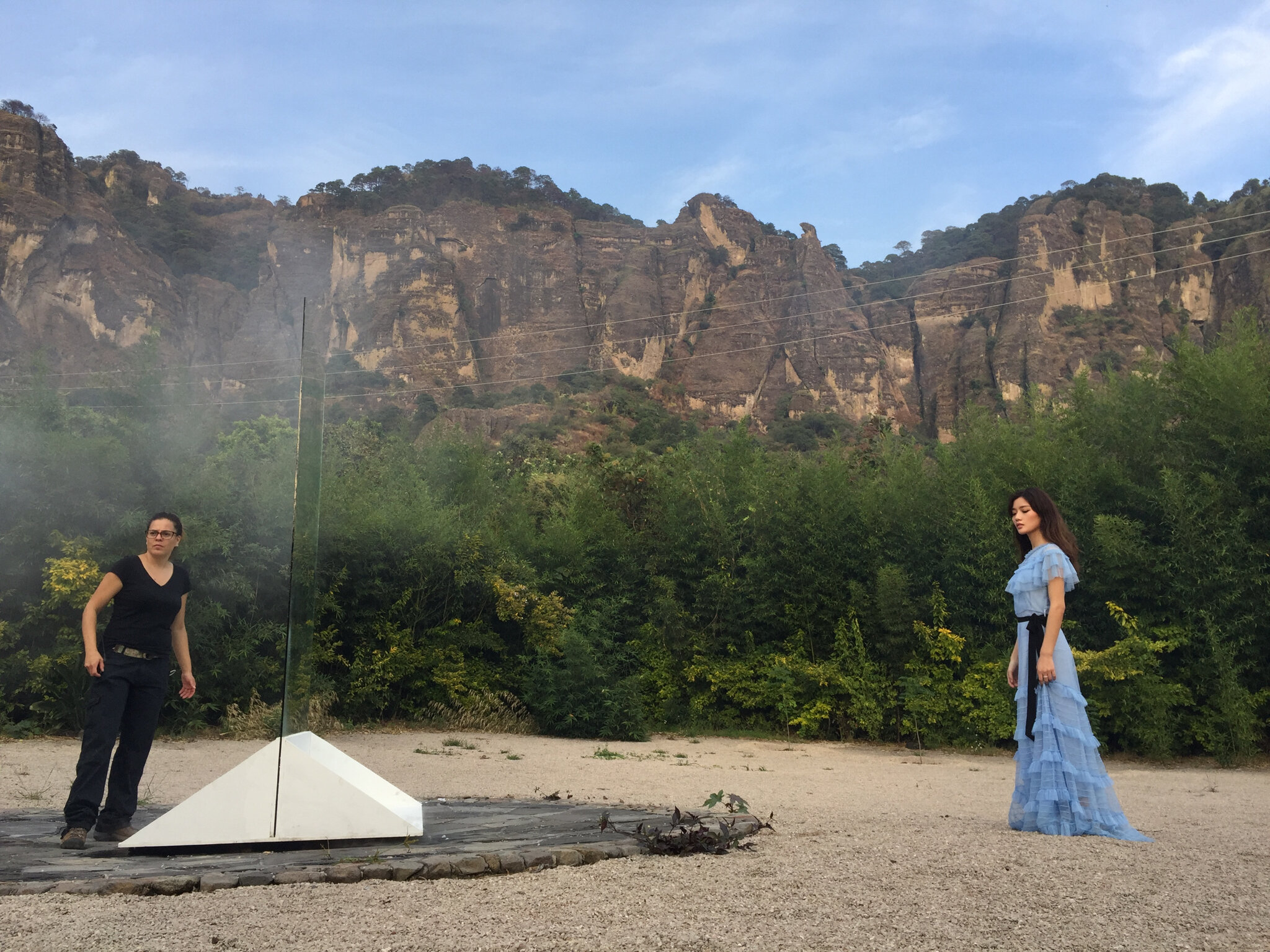 Tepoztlån, Mexico. An assistant director helps talent find her mark.