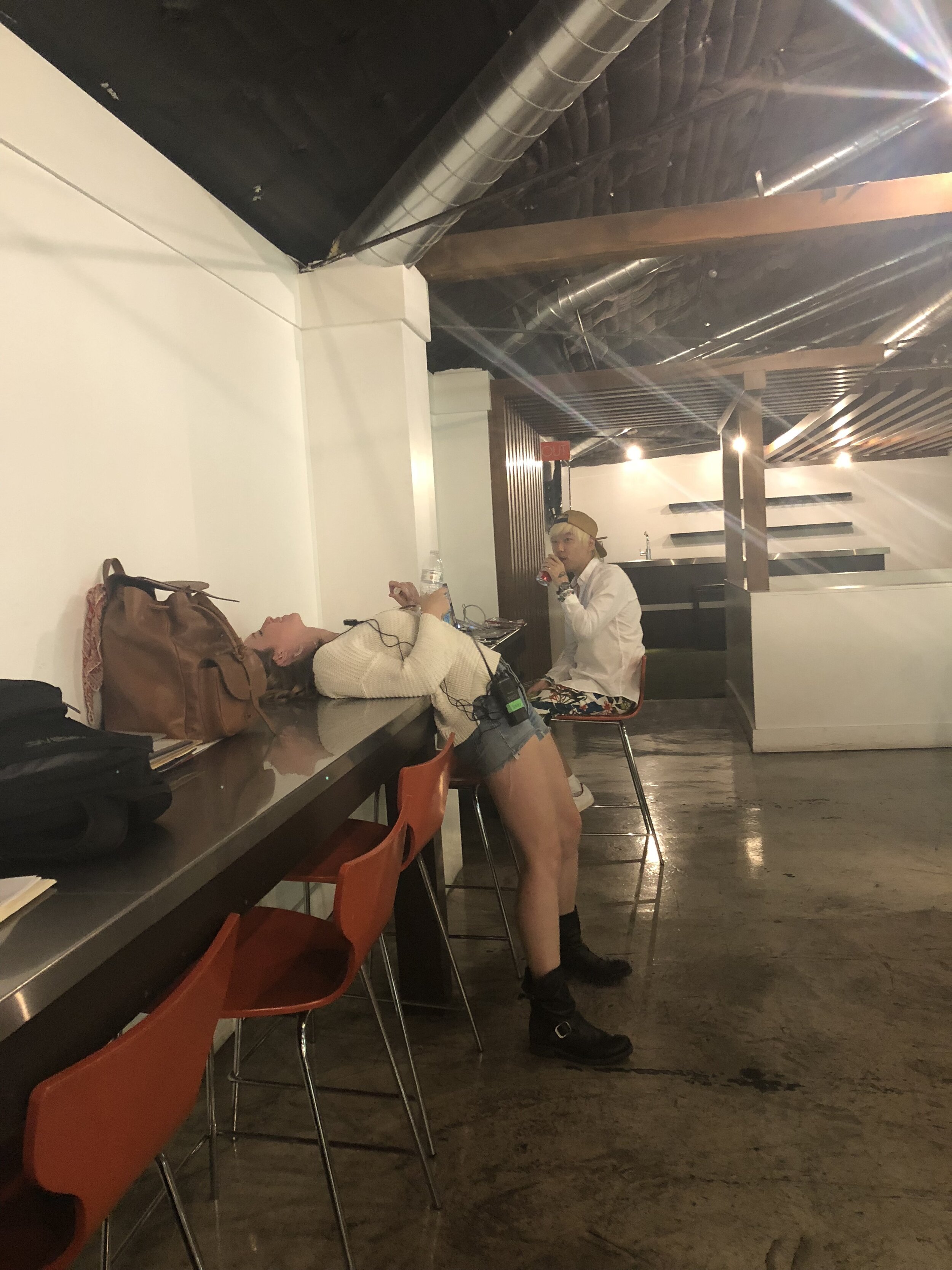 Los Angeles, CA. Hard working crew takes pause to maintain sanity.