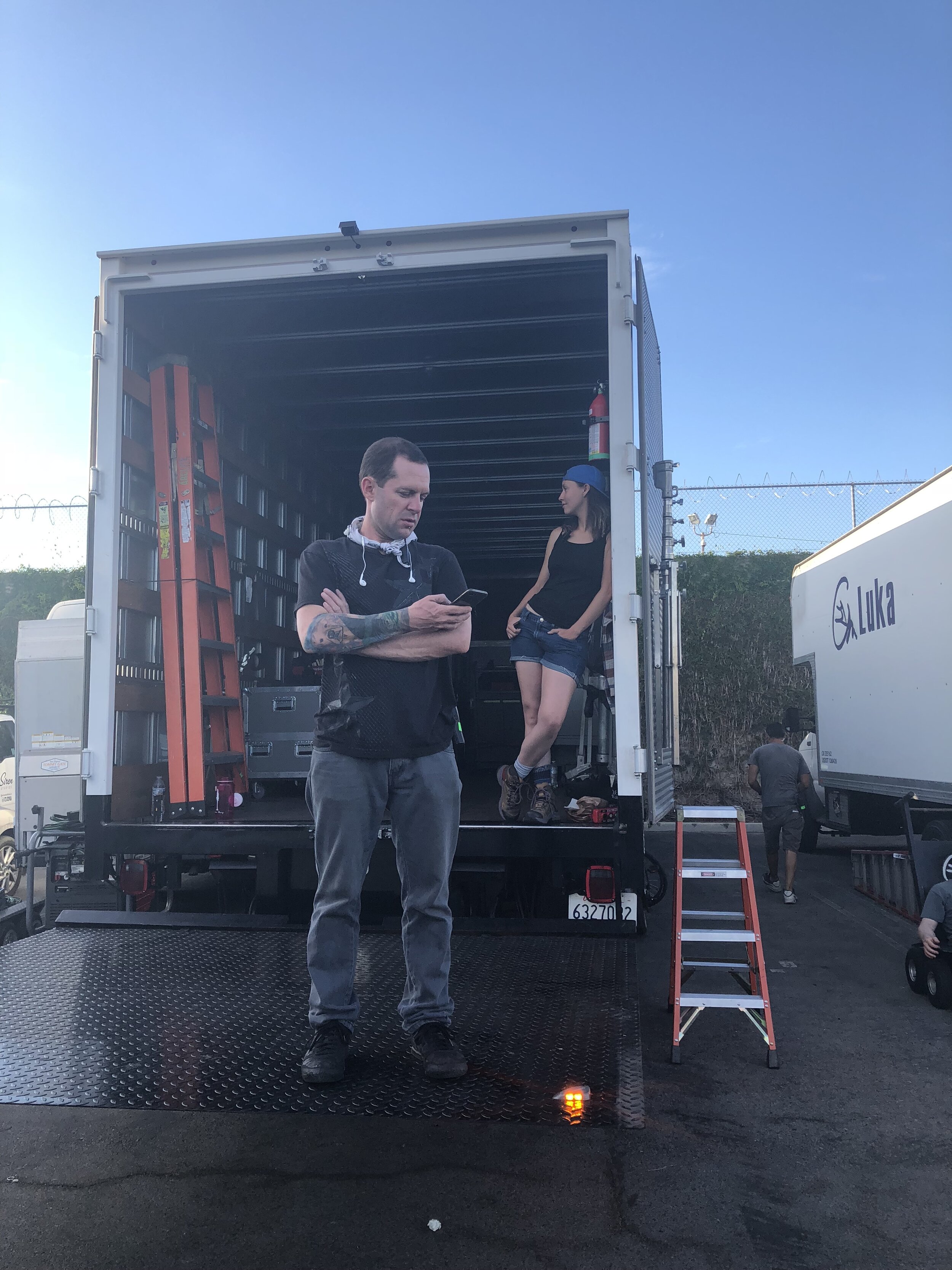Los Angeles, CA. Grips arrive to set early and patiently wait for the rest of their crew.