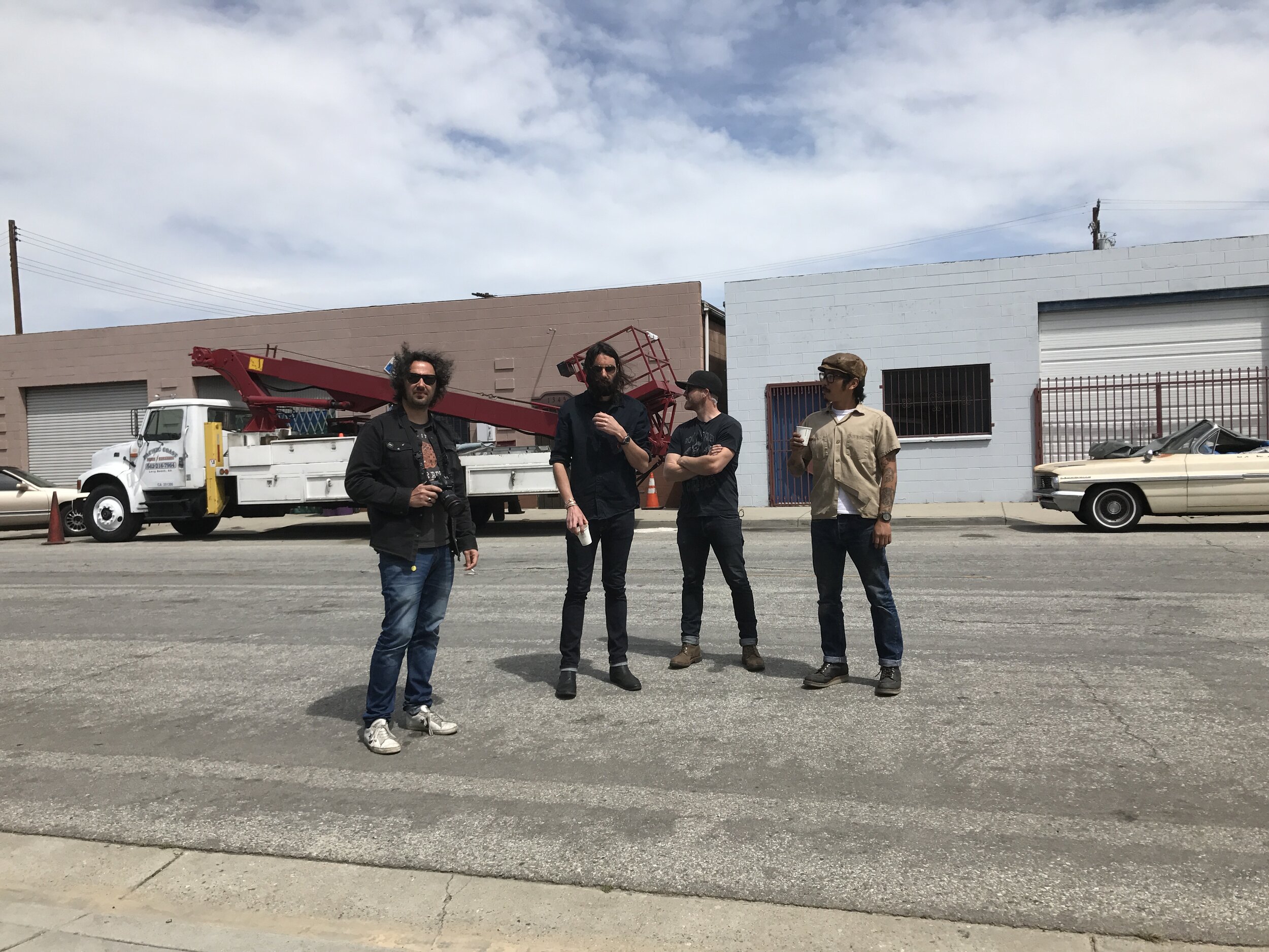 Los Angeles, CA. Talent and clients chat over lunch break.