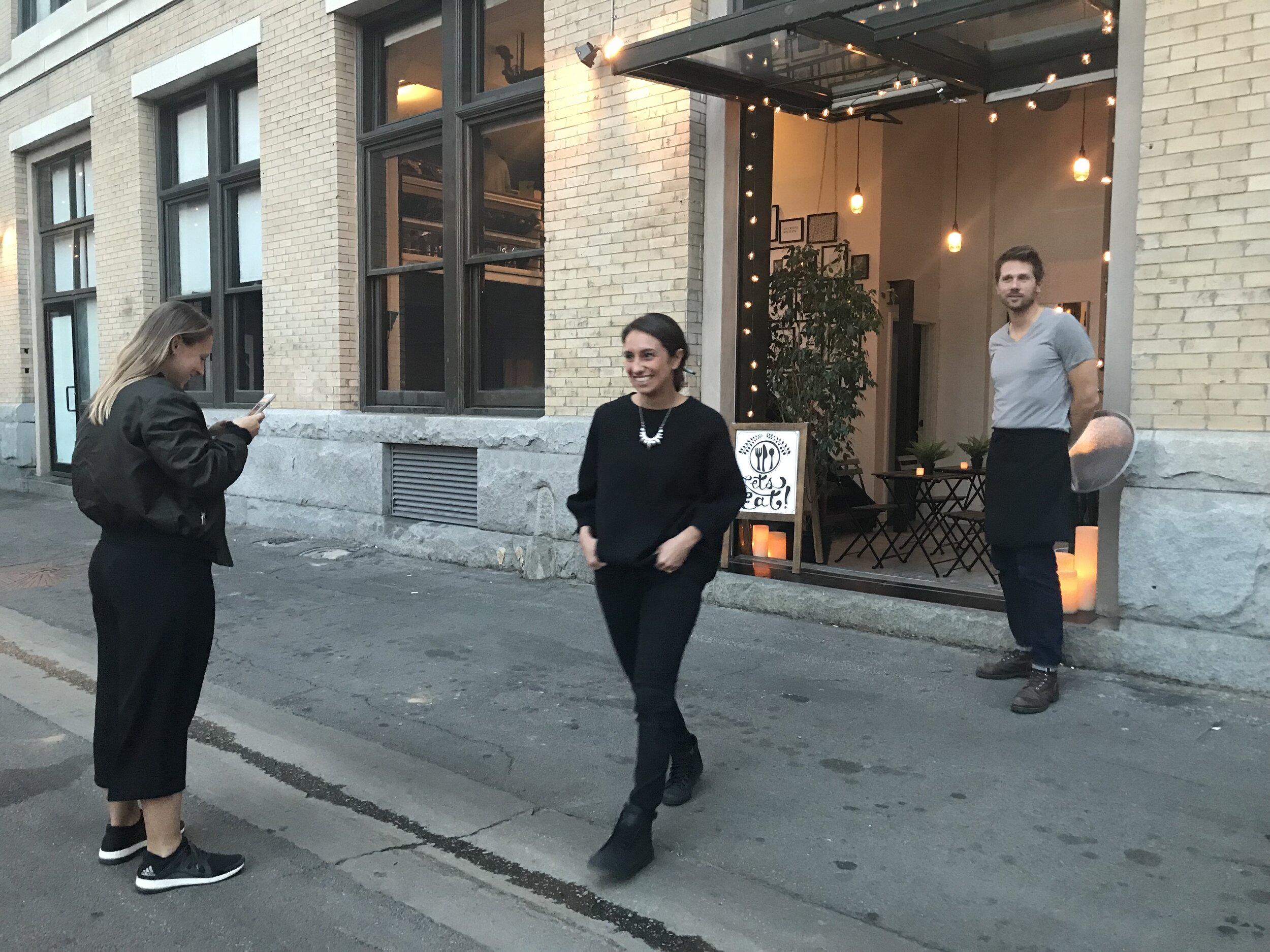 DTLA CA. Clients joke with each other on a commercial shoot for YogaGlo.