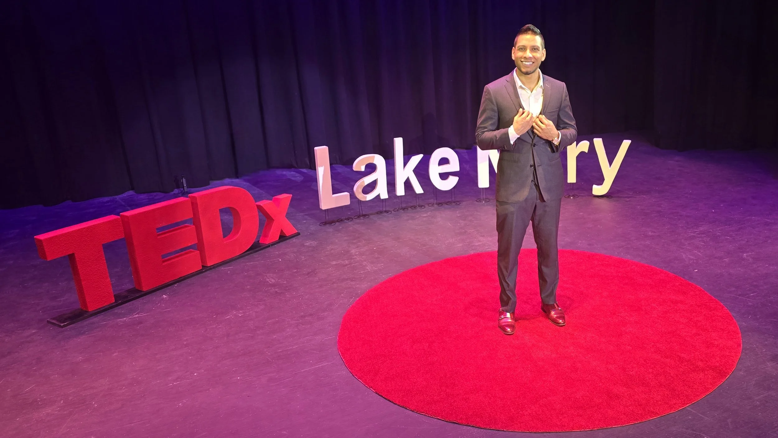 Keith Kong performing live on the TEDx stage, delivering a high-impact mentalism experience