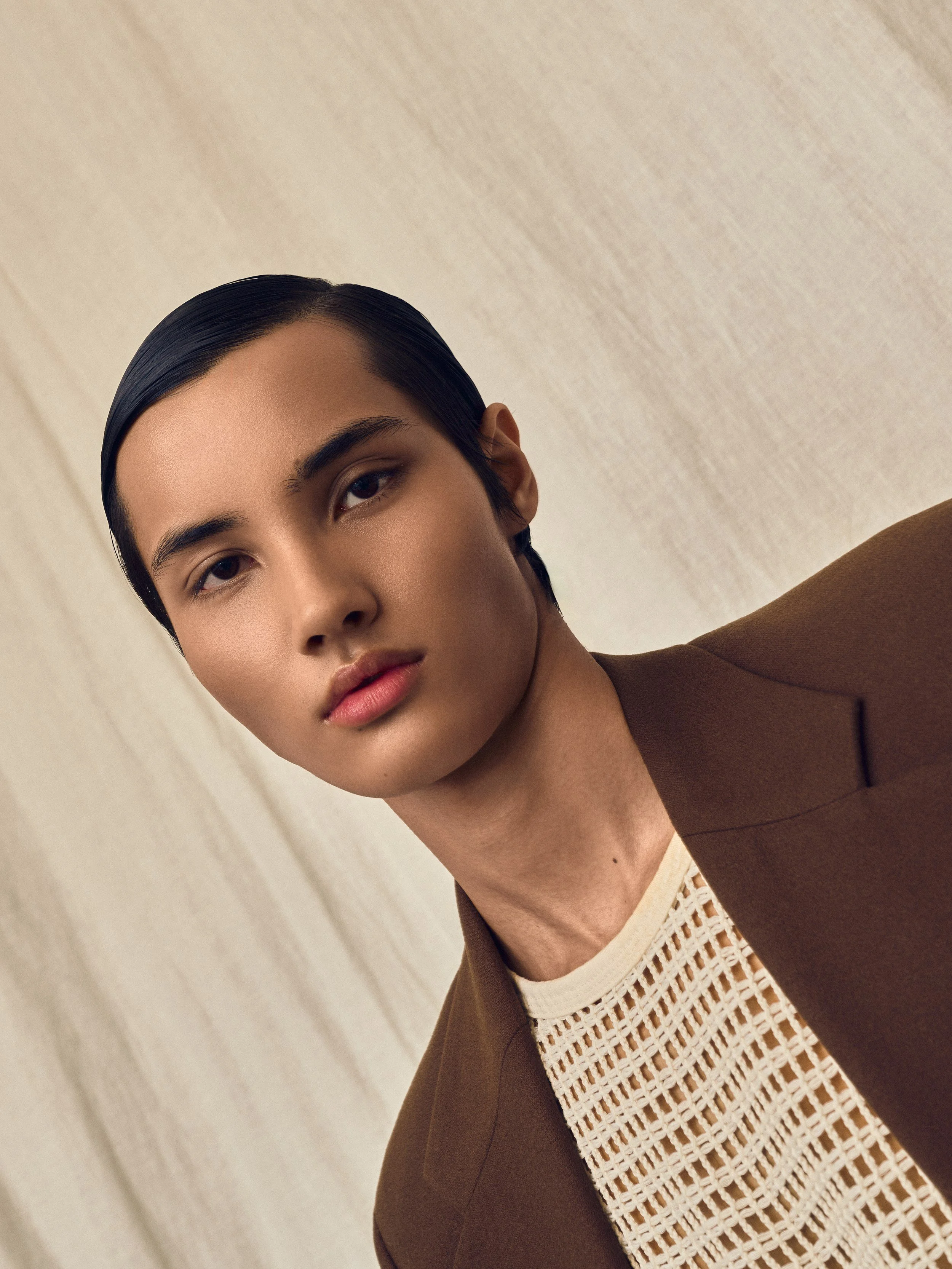 Editorial high fashion test with stylist ToR. Sculptural poses, accessory-forward styling, neutral studio architecture and controlled window light. Editorial, campaign and lookbook oriented. Models: Zion, Henry, Christian.