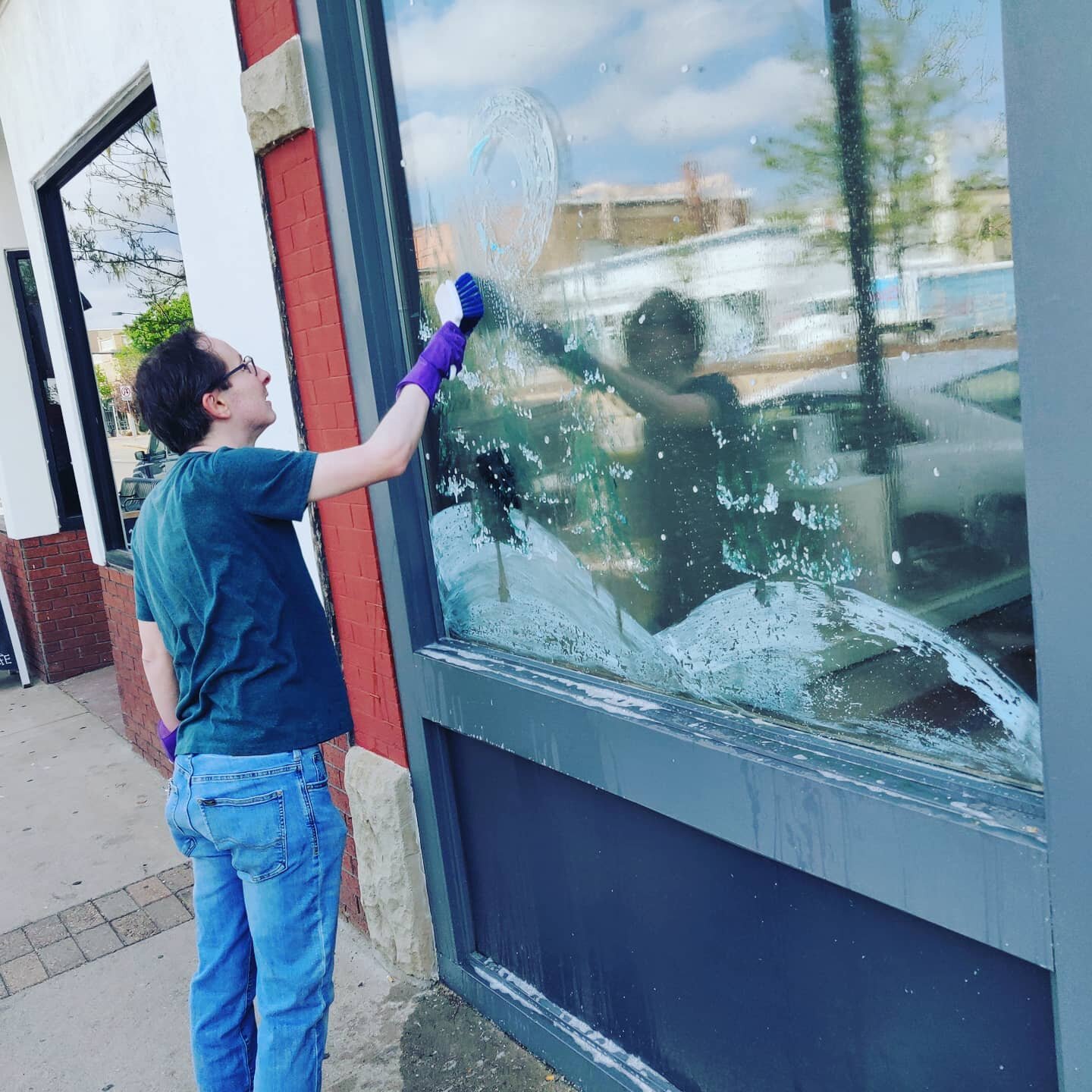Scrub, scrape.  Time to take the winter scene off our windows. What should we put here next?