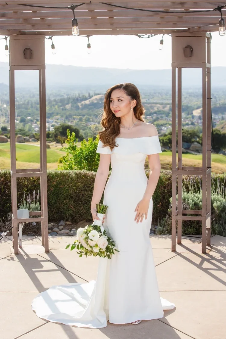 Cintha on her wedding day wearing her Bridal Gown Studio San Jose gown