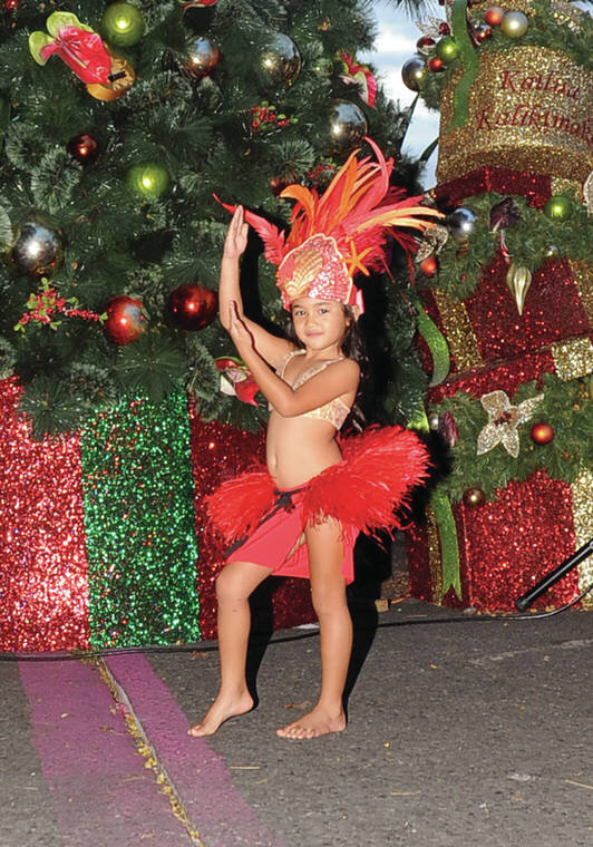  Little Miss Kona Coffee Niihau Alapai performs at the Kailua Village Christmas Tree Lighting Ceremony Friday at Emma Square. (Laura Ruminski/West Hawaii Today) 