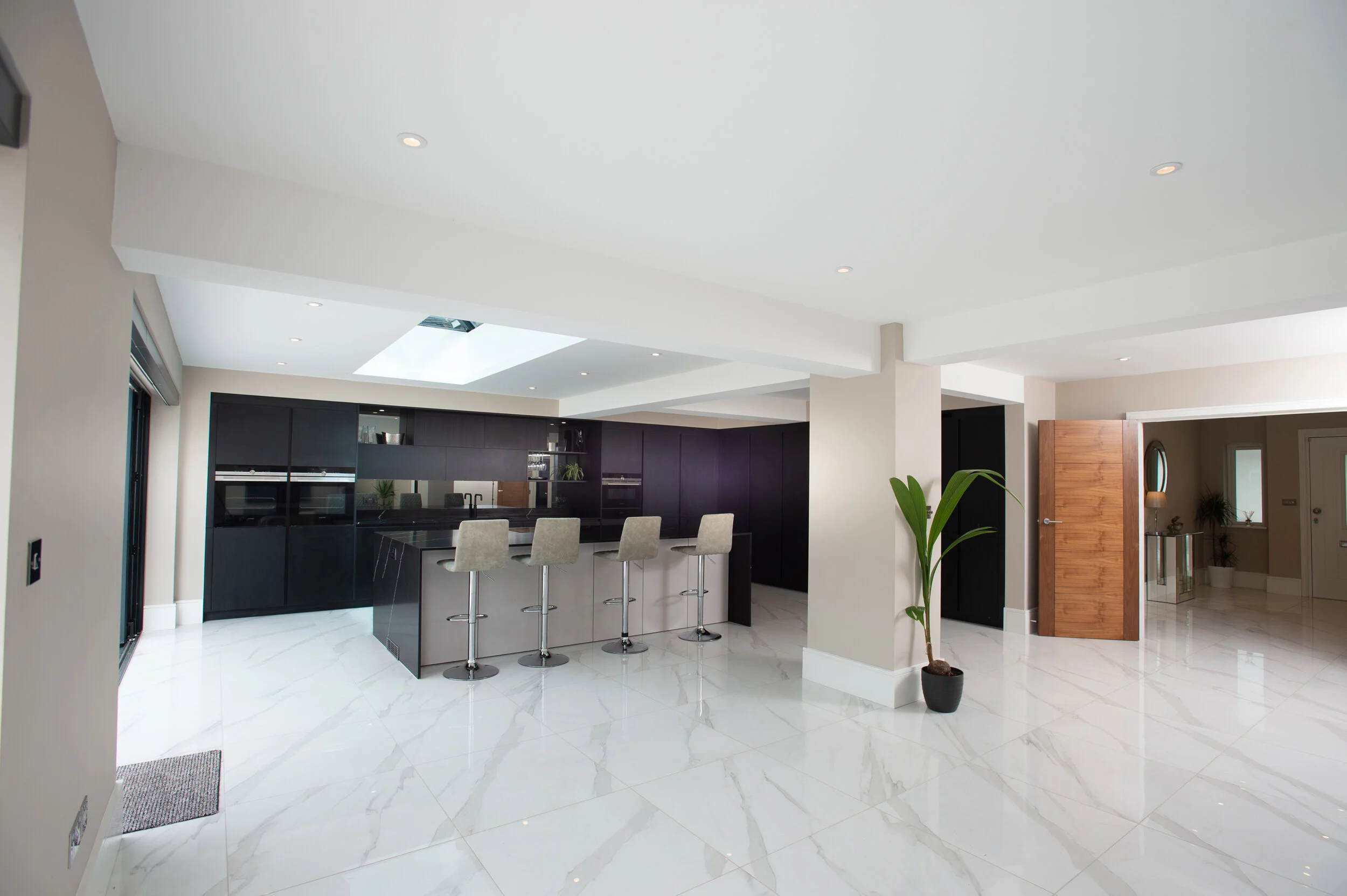 _Ultra-luxe Black Oak Kitchen by Brandt Design [3].jpg
