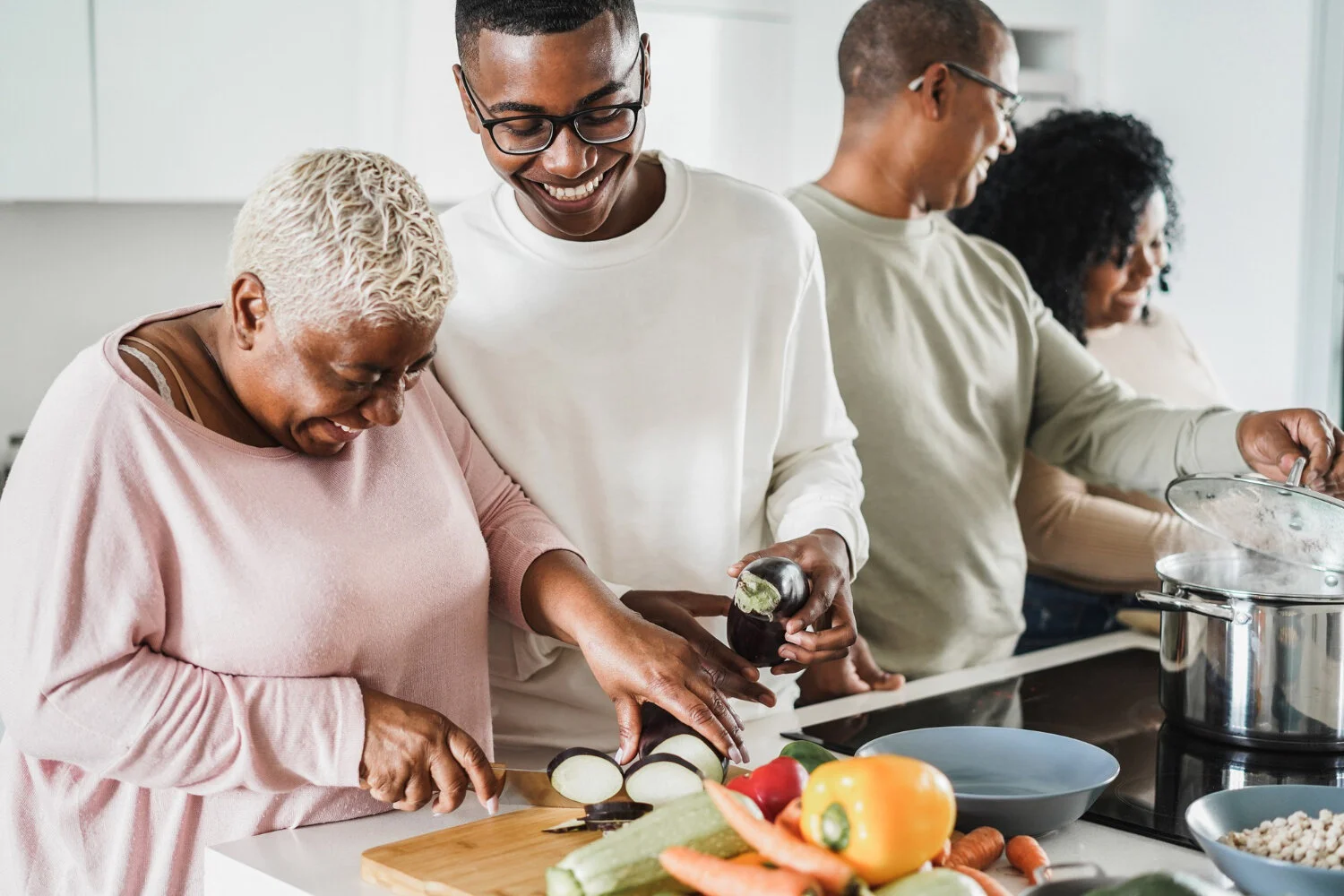 happy-black-family-cooking-inside-kitchen-home-father-daughter-son-mother-having-fun-preparing-lunch-main-focus-boy-face.jpg