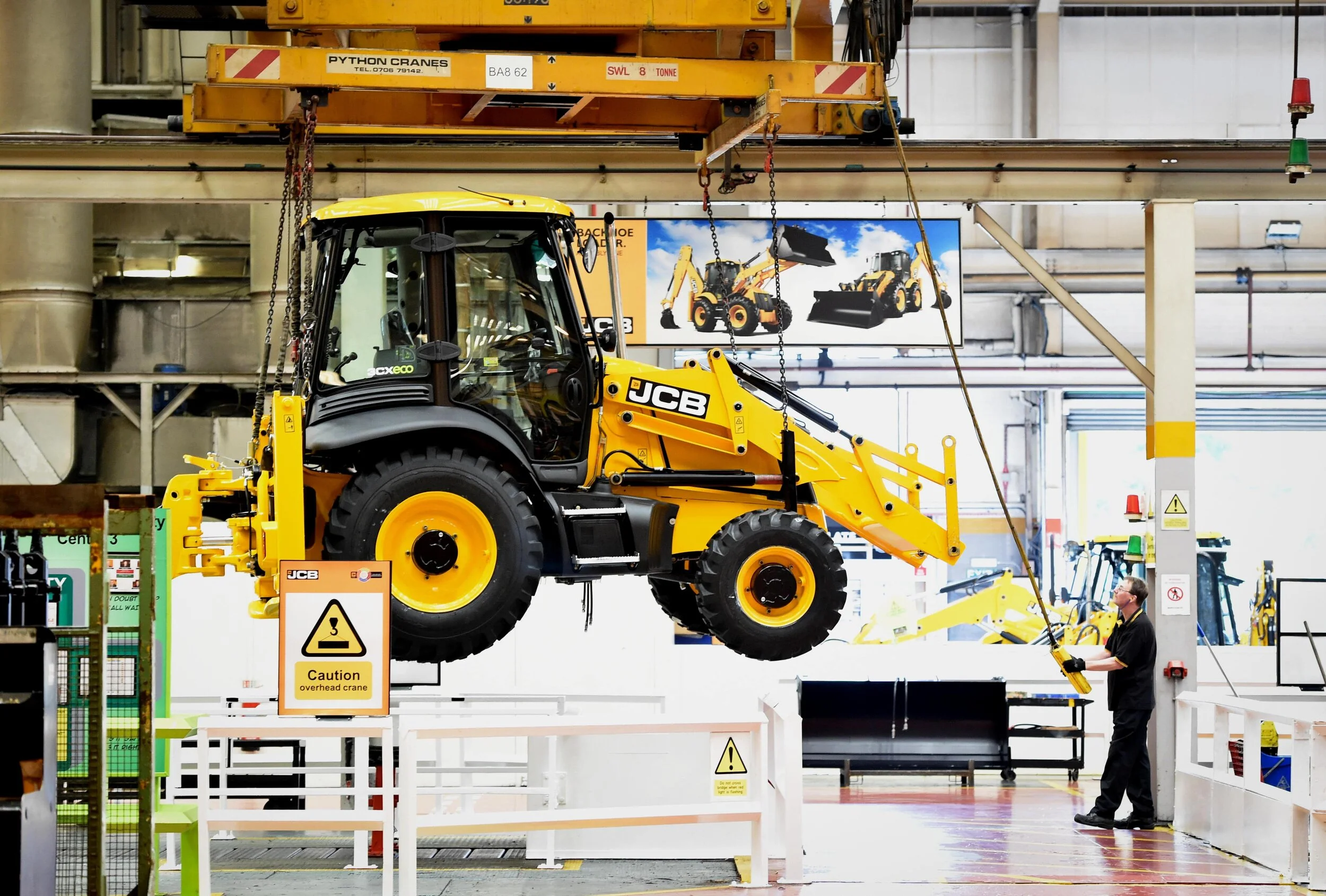 A JCB backhoe comes off the production line-min.jpg