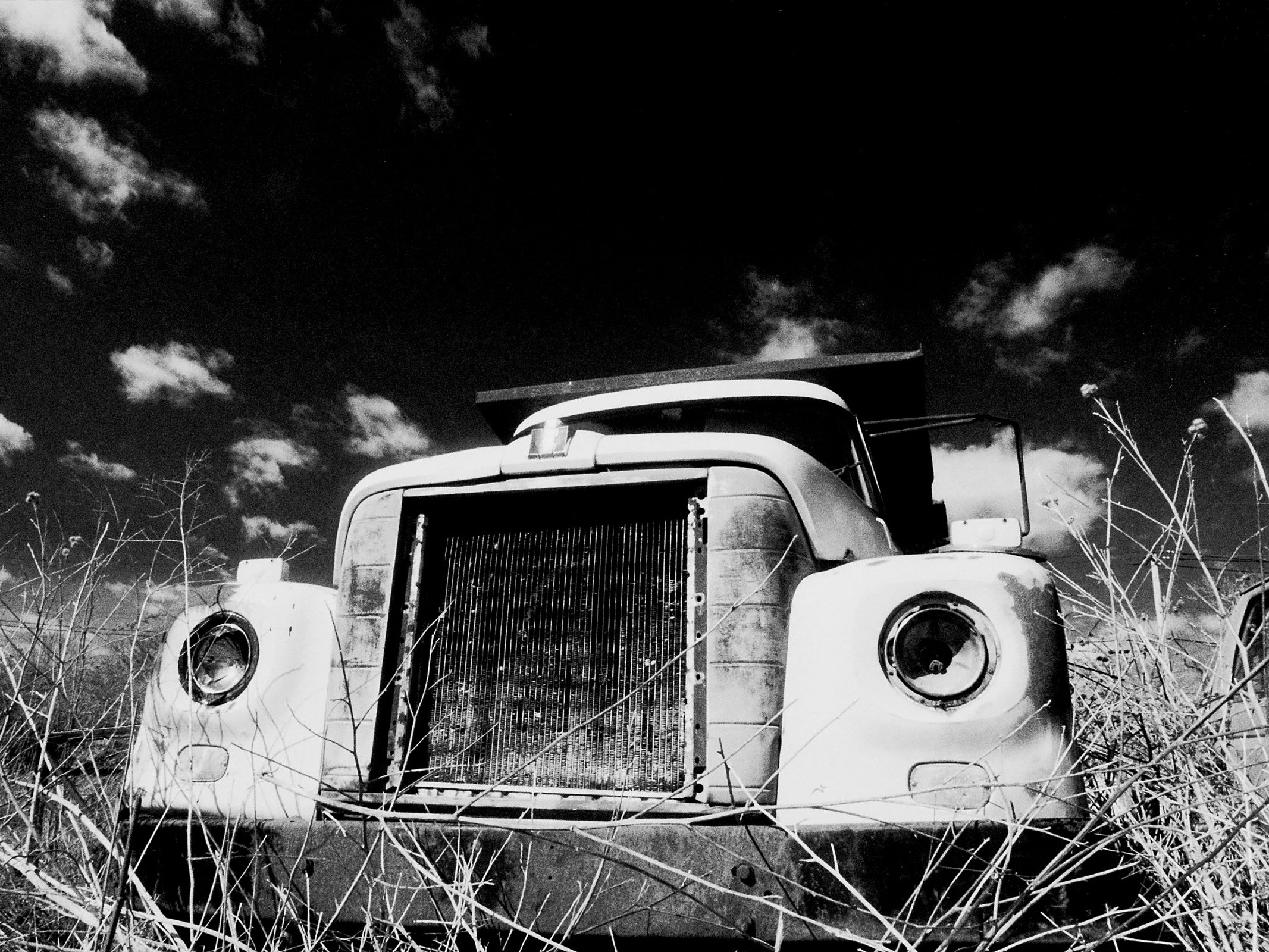 Abandoned Truck, Middletown, R.I, U.S.A  - Silver Gelatin Print. Urban Abandonment, exploring the urban decay and remnants that surround our everyday lives that now live only in our memories. 