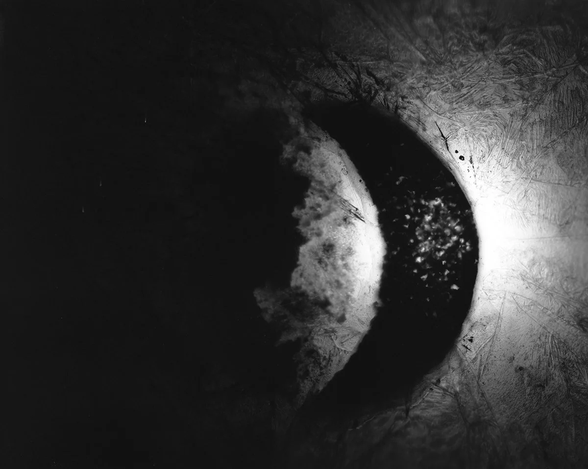 Interpretation of a foreign eclipse.
Distant Eclipse #1 - Cliche Verre and Collage - multiple hand altered acrylic, acetate and film sheets directly exposed to a 4x5" sheet of B&W Fomapan 100 Film.