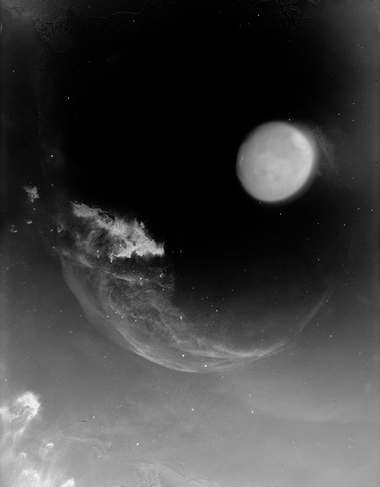 Interpretation of an unknown area of space. 
Space And Time #220 - Cliche Verre and Collage - 3 hand altered acrylic and acetate sheets directly exposed to a 4x5" sheet of B&W Fomapan 100 Film.