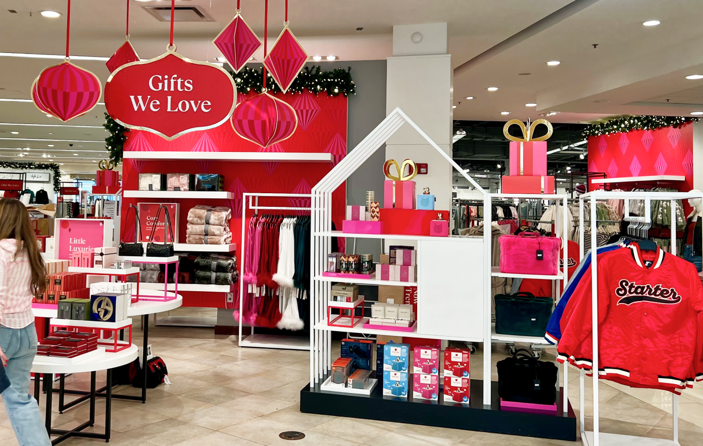 Macy’s holiday gifting display featuring a curated mix of giftable products under the “Gifts We Love” theme.