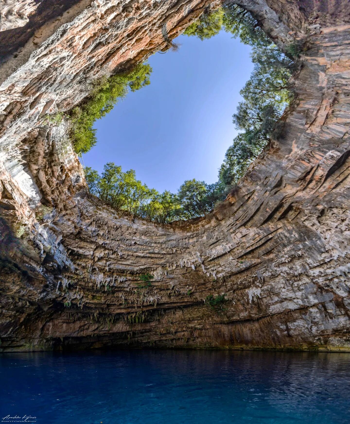 Melissani cave lake
A true surprise, a natural wonder, the Melissani cave lake is the outlet of a massive underground geological network of cracks that spans the entire island of Kefallonia, in Western Greece. 
The Melissani cave has two distinct cha