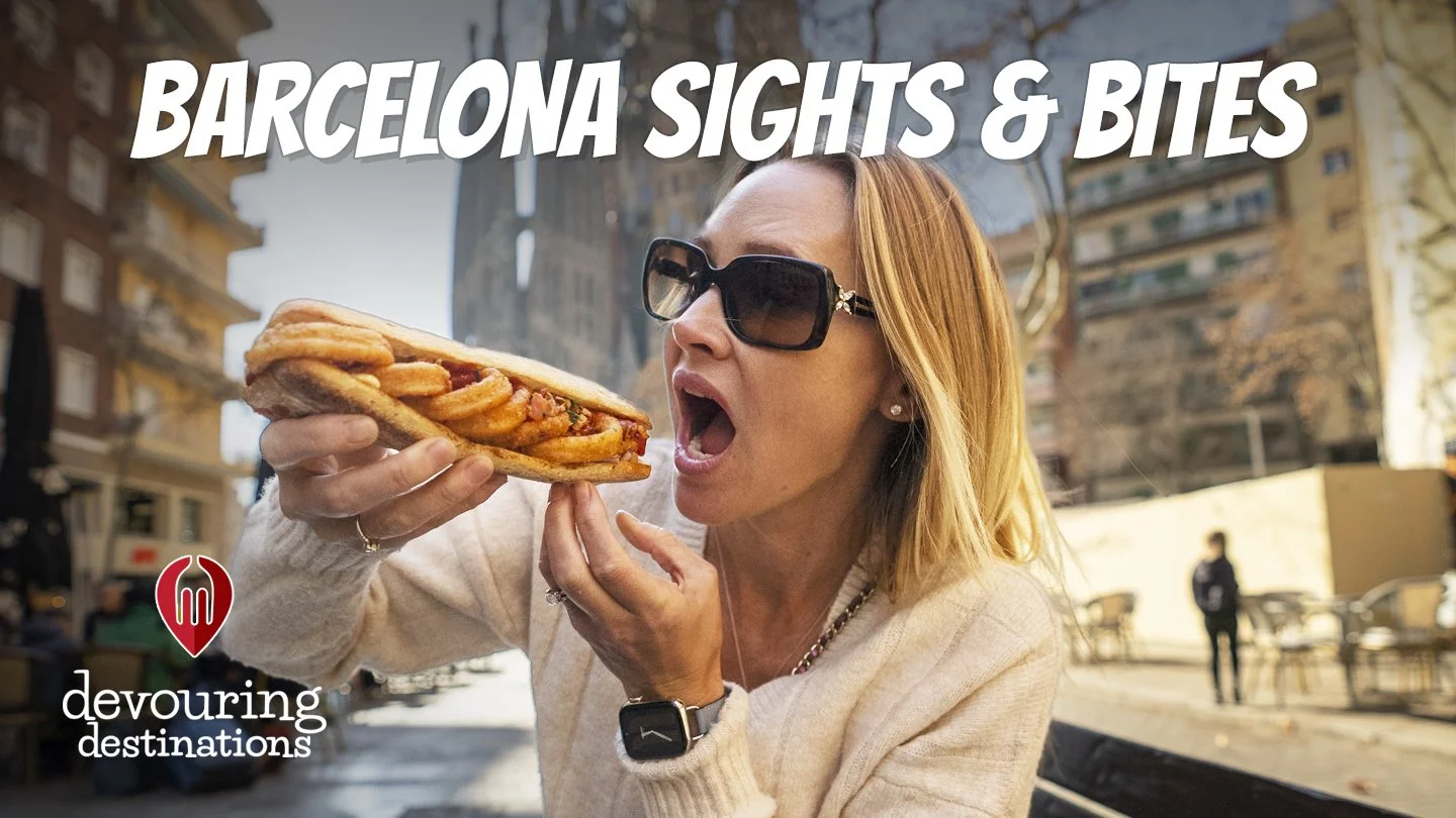 Erin Lockwood eating a calamari sandwich in front of La Sagrada Familia