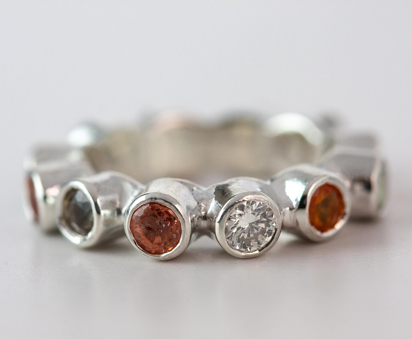 &ldquo;Mimi&rdquo; in sterling silver, multicolor sapphires, and one diamond.

DM for purchase details.