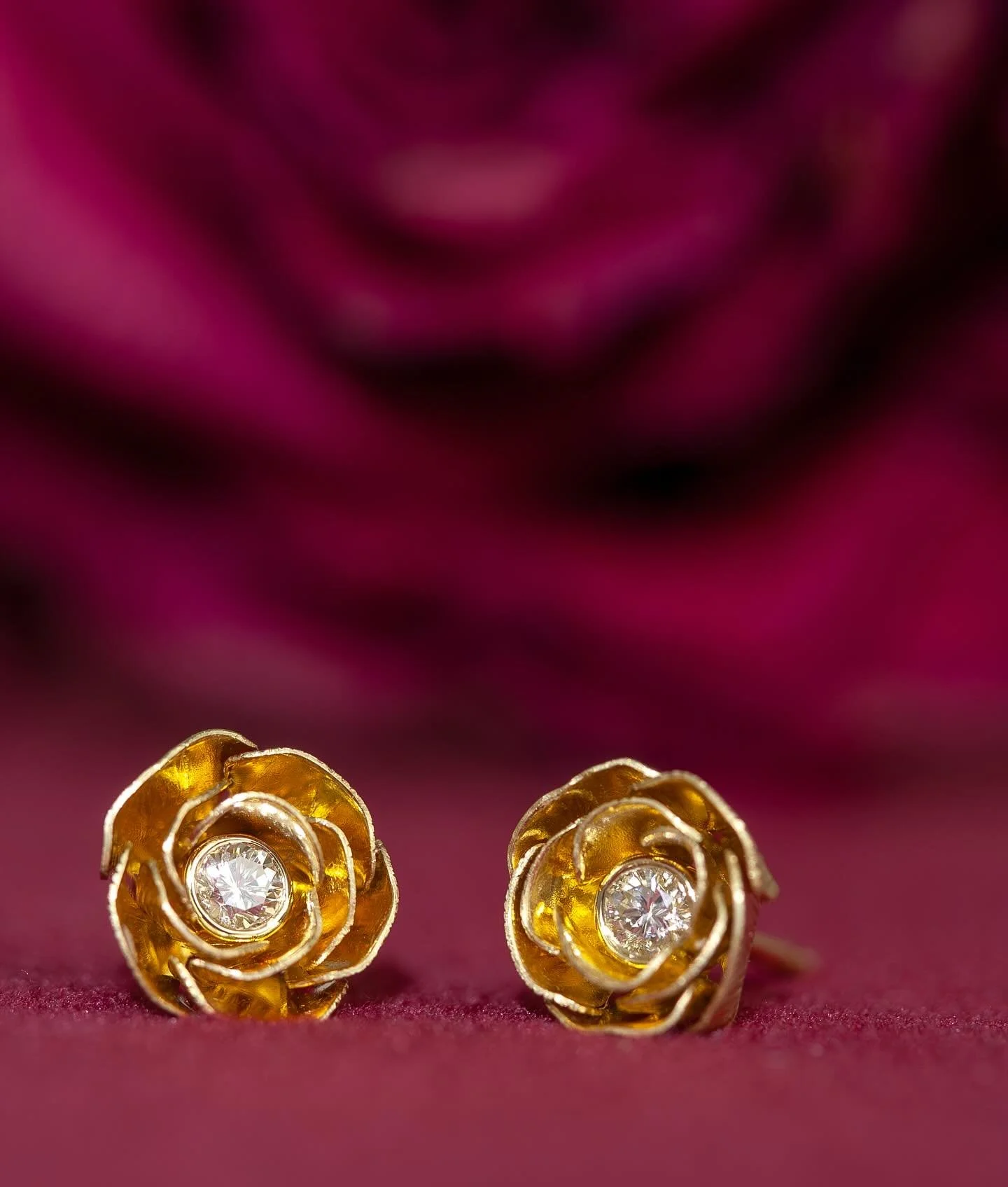 &ldquo;Coming Up Roses&rdquo; Handcrafted for Pure Earth in 18-karat gold and diamond. The roses, friction nuts, and posts were fabricated in their entirety from fairmined gold sheets and wires, then pierced and Florentine textured, layered, formed i
