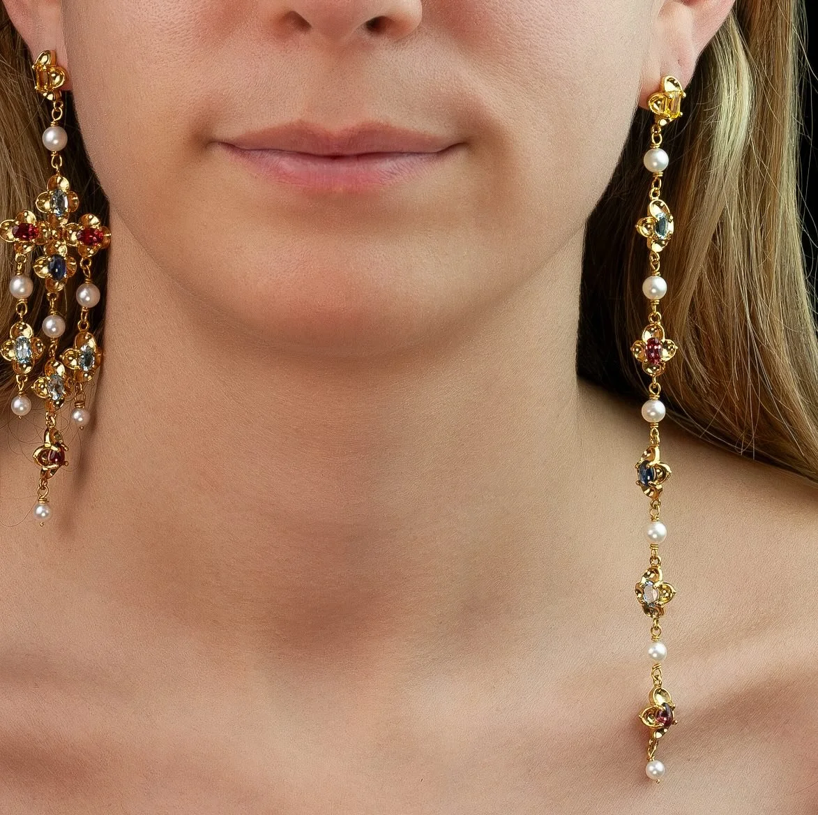 &ldquo;Gemma&rdquo; and &ldquo;Renaissance Dream&rdquo; earrings in 22-karat gold, rhodolite, cultured salt water pearl, aquamarine, yellow sapphire, and blue sapphire.