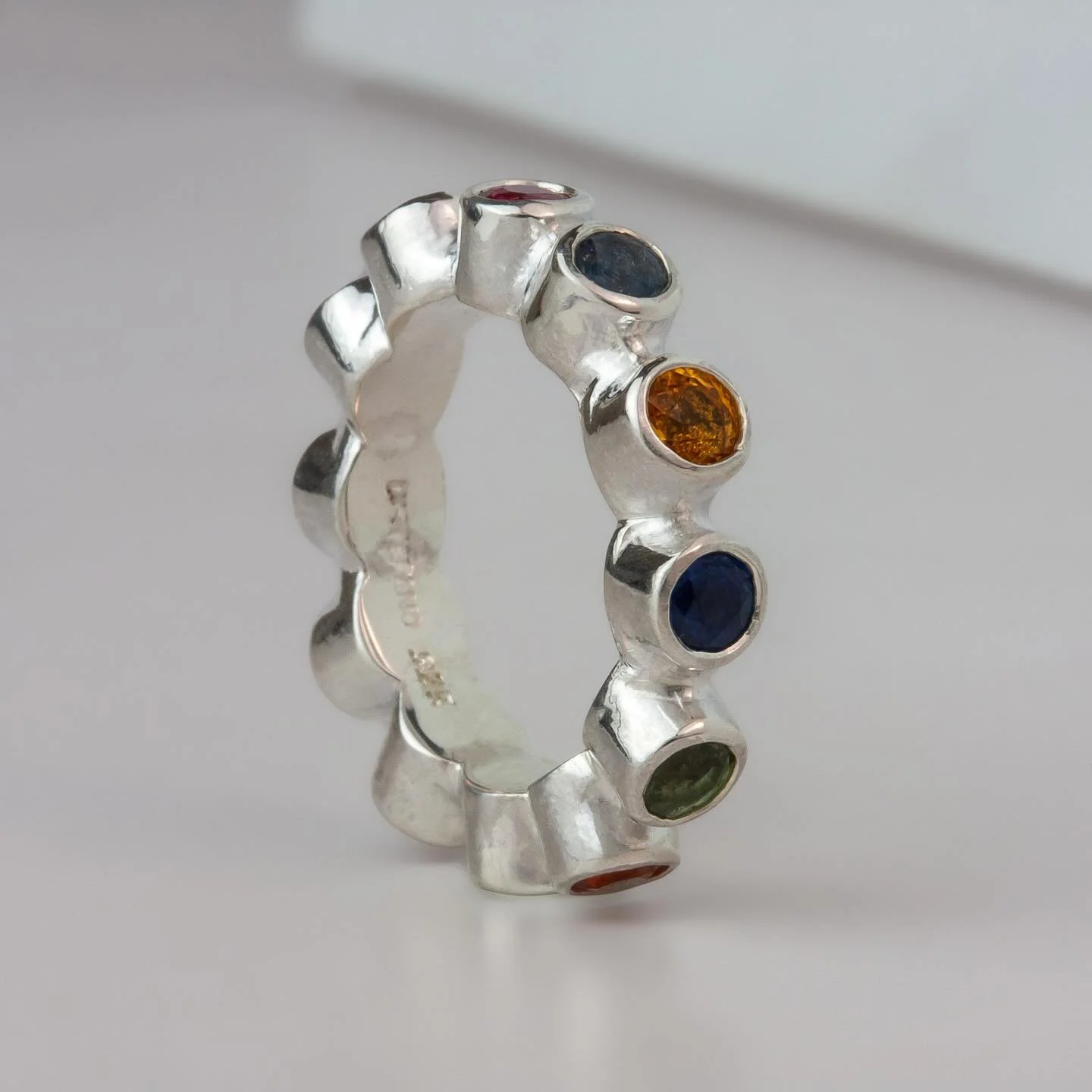 Our &ldquo;Mimi&rdquo; in sterling silver and multicolored sapphires. Based on a Roman bezel ring from 300AD. 

#metalfirelove #rainbow #madeinnyc #handcrafted #eternityring