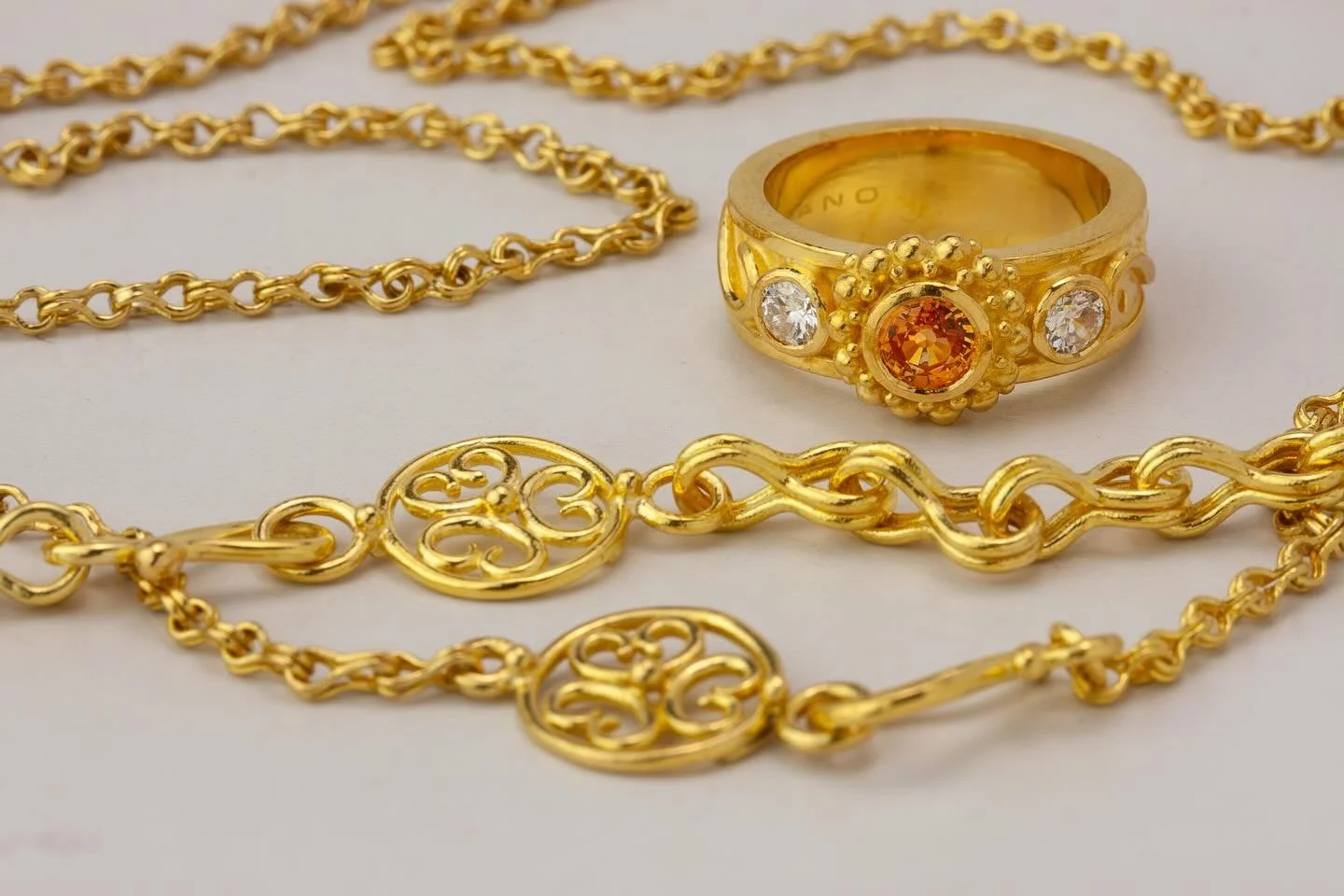 Midnight. Imagined.

I made the first version of this ring in the early 1990s and named it Midnight &mdash;but I don&rsquo;t remember why.

Here, it&rsquo;s reimagined in a custom alloy of 22-karat gold, set with a faceted Spessartite garnet and flan