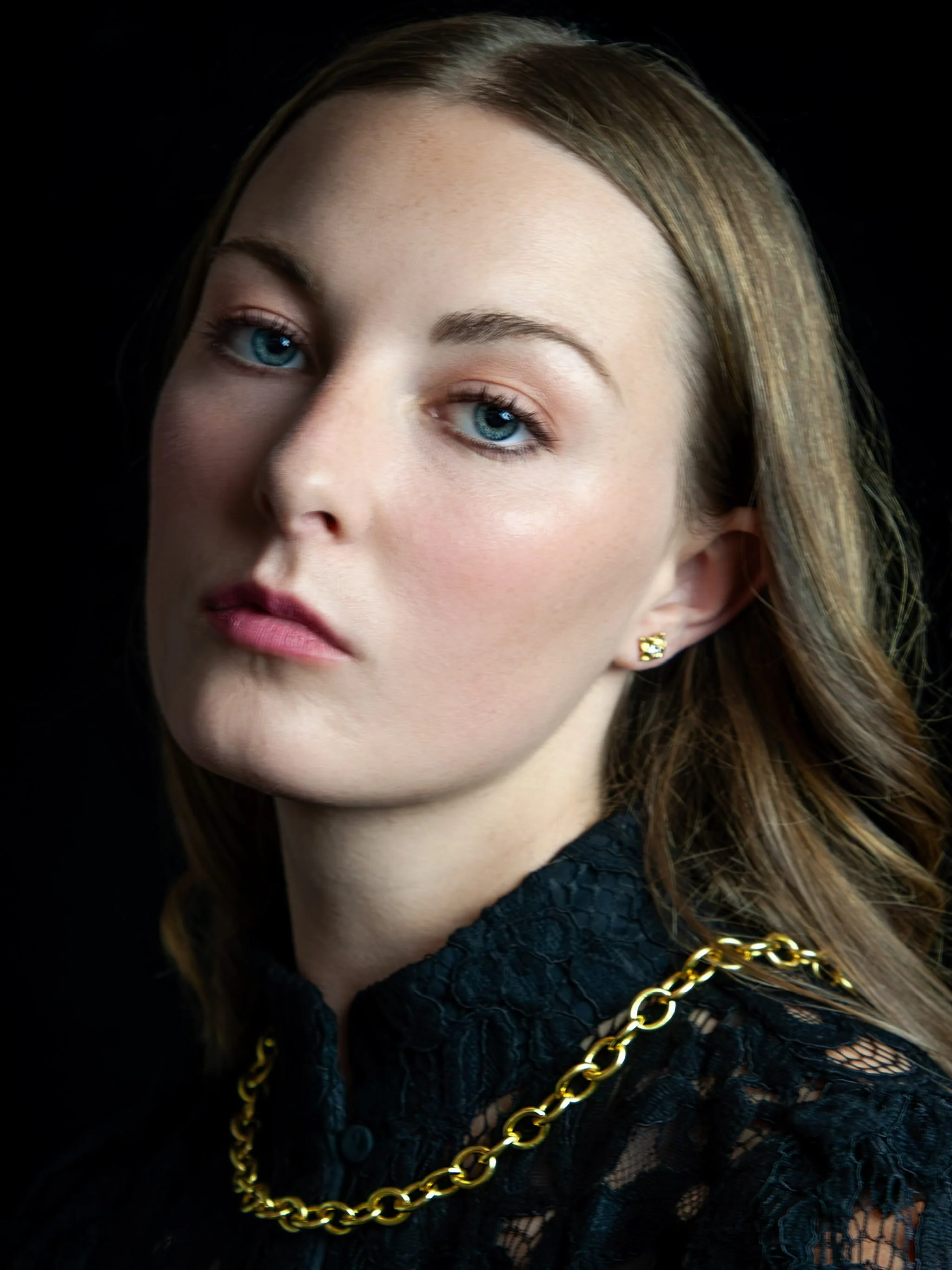 Chiaroscuro in photography by Sean Younger Thomas.

The subject is Carolyn Crines, our goldsmith in training, true artist, and soon-to-be world explorer.

Carolyn is wearing our &ldquo;Genoese&rdquo; chain from &ldquo;Off the Canvas&rdquo; for the Fr